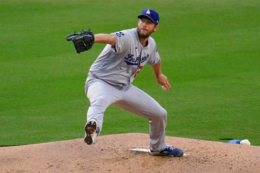 Los Angeles Dodgers starting pitcher Clayton Kershaw works against a San Diego Padres batter during the first inning of a baseball game Saturday, April 17, 2021, in San Diego. (AP Photo/Gregory Bull)