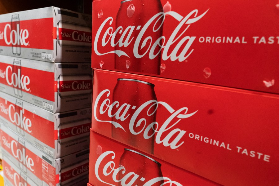 In this Monday, April 5, 2021 file photo, cases of Coca-Cola are displayed in a supermarket, in New York. Coca-Cola Co. (AP Photo/Mark Lennihan, File)