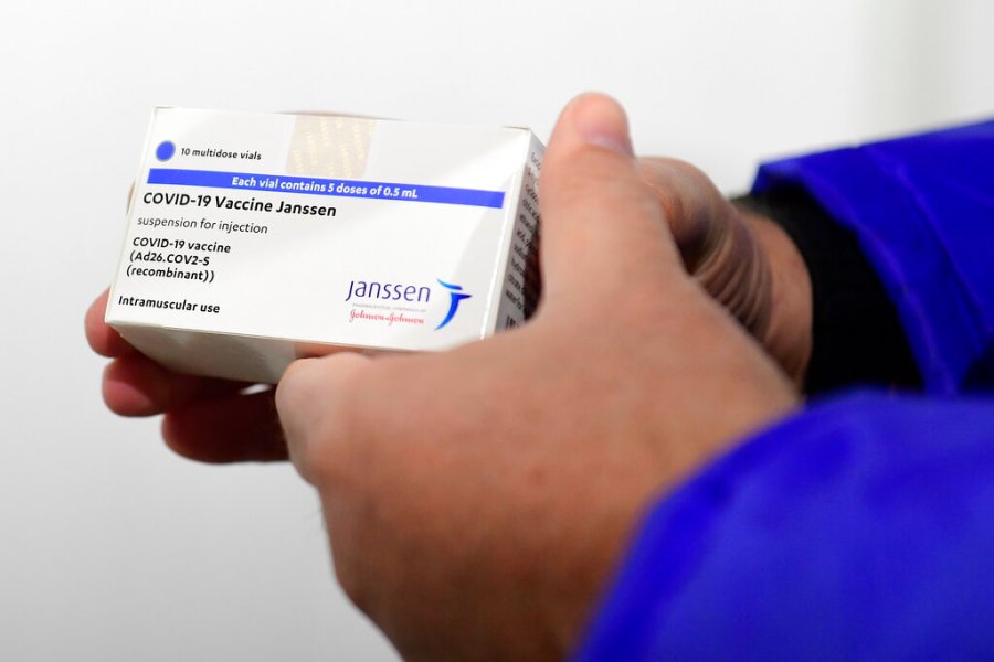 In this April 13, 2021, file photo, a box of Johnson & Johnson vaccines are shown by pharmacist Zsolt Szenasi at a warehouse of Hungaropharma, a Hungarian pharmaceutical wholesale company, in Budapest, Hungary. (Szilard Koszticsak/MTI via AP, File)