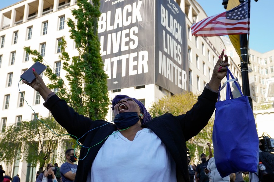 Lisa Robinson of Washington, reacts on April 20, 2021, in D.C., as the guilty verdict is read in Minneapolis in the murder trial against former Minneapolis police officer Derek Chauvin. (Alex Brandon / Associated Press)