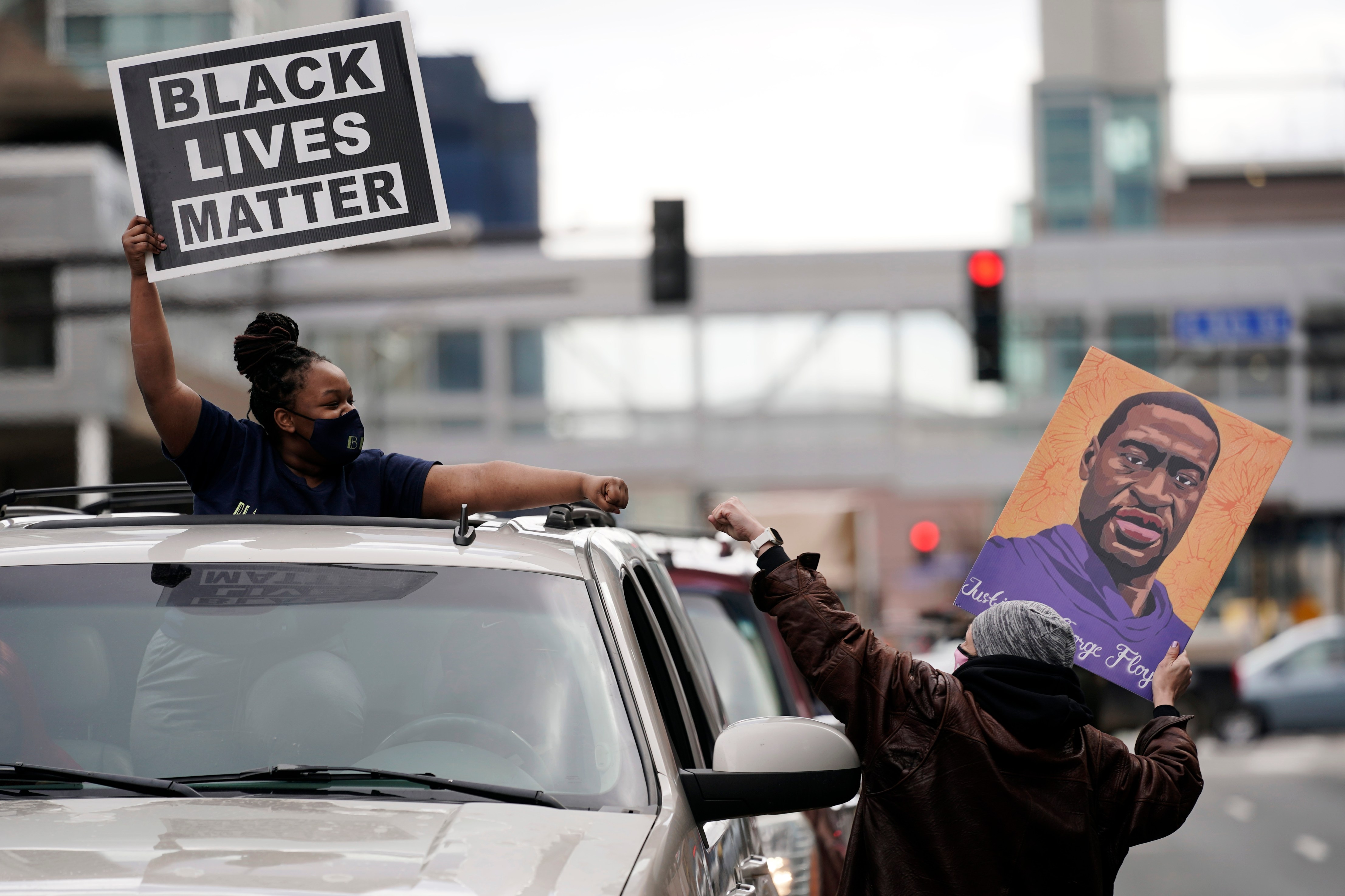 People celebrate in Minneapolis after a guilty verdict was announced at the trial of former Minneapolis police Officer Derek Chauvin for the 2020 death of George Floyd on April 20, 2021. (Morry Gash / Associated Press)