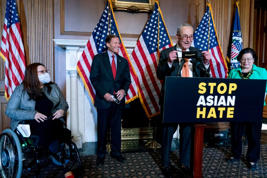 Senate Majority Leader Chuck Schumer of N.Y., accompanied by Sen. Mazie Hirono, D-Hawaii, Sen. Tammy Duckworth, D-Ill., and Sen. Richard Blumenthal, D-Conn., speaks at a news conference after the Senate passed a COVID-19 Hate Crimes Act on Capitol Hill, Thursday, April 22, 2021, in Washington. (AP Photo/Andrew Harnik)