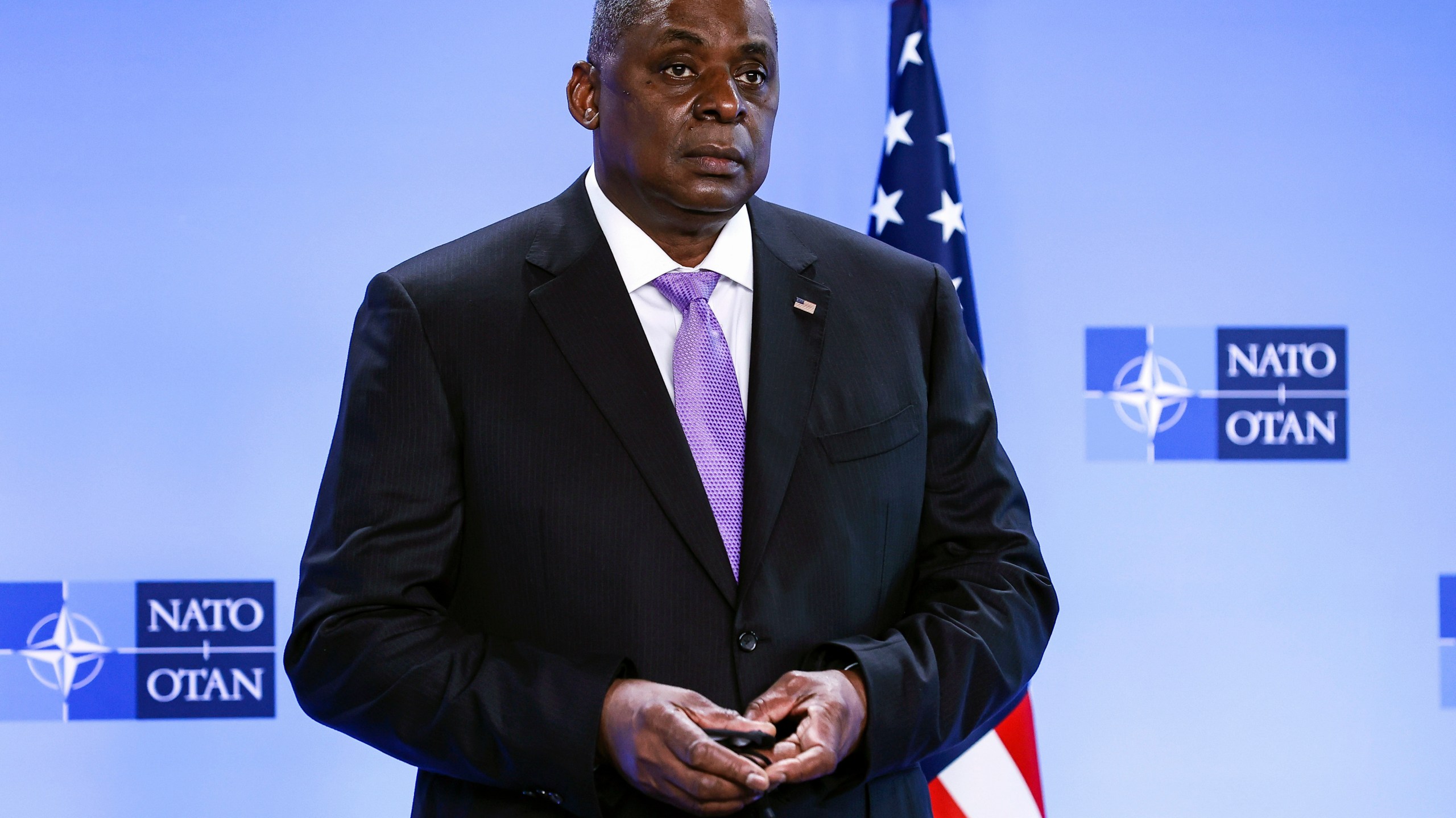 In this April 14, 2021, file photo, Secretary of Defense Lloyd Austin poses for photographers as he arrives at NATO headquarters in Brussels. The Associated Press has learned that a Pentagon panel is recommending that decisions to prosecute service members for sexual assault be made by independent authorities, not commanders. It would be a major reversal of military practice and a change long sought by Congress members. (Kenzo Tribouillard, Pool via AP)