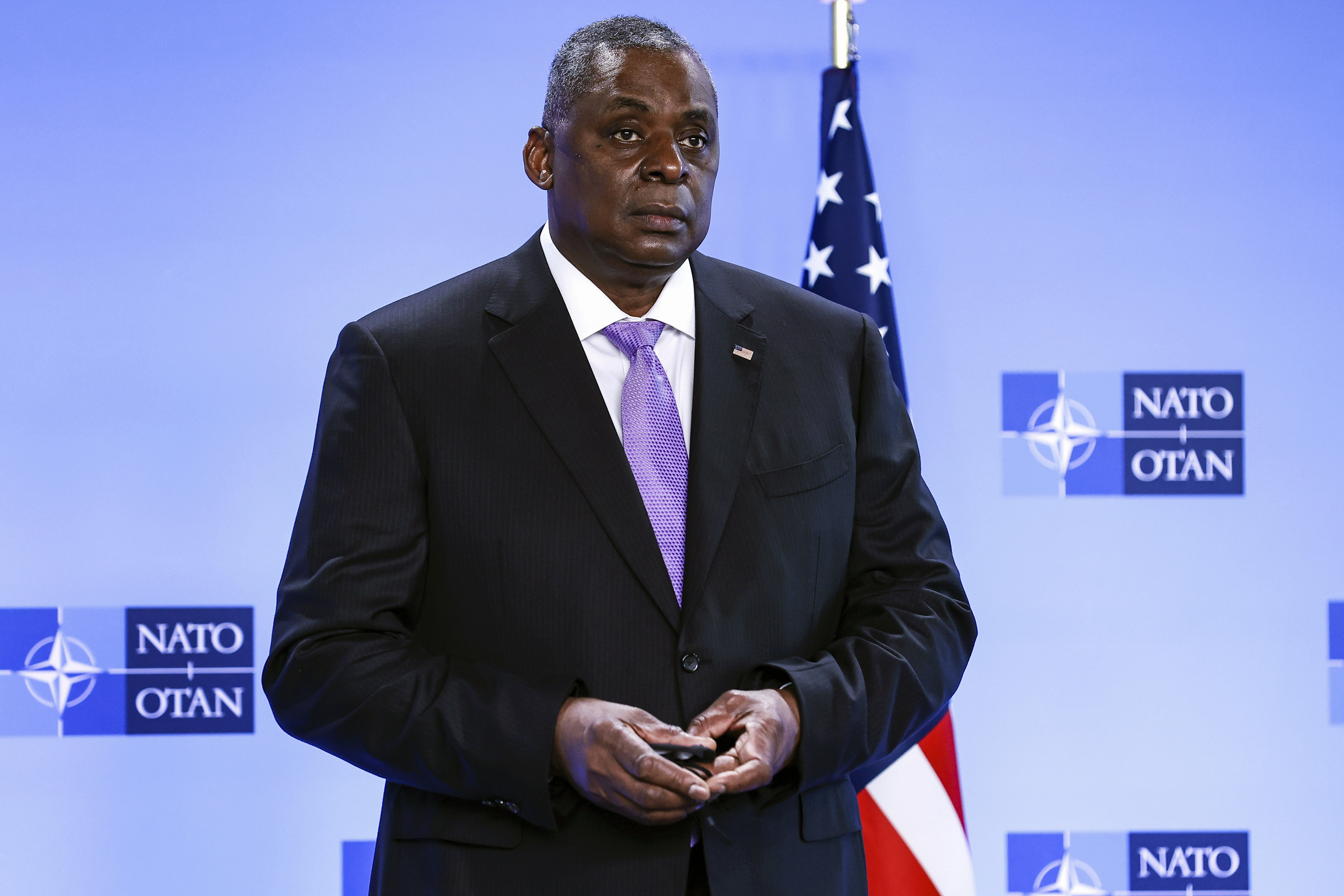 In this April 14, 2021, file photo, Secretary of Defense Lloyd Austin poses for photographers as he arrives at NATO headquarters in Brussels. The Associated Press has learned that a Pentagon panel is recommending that decisions to prosecute service members for sexual assault be made by independent authorities, not commanders. It would be a major reversal of military practice and a change long sought by Congress members. (Kenzo Tribouillard, Pool via AP)