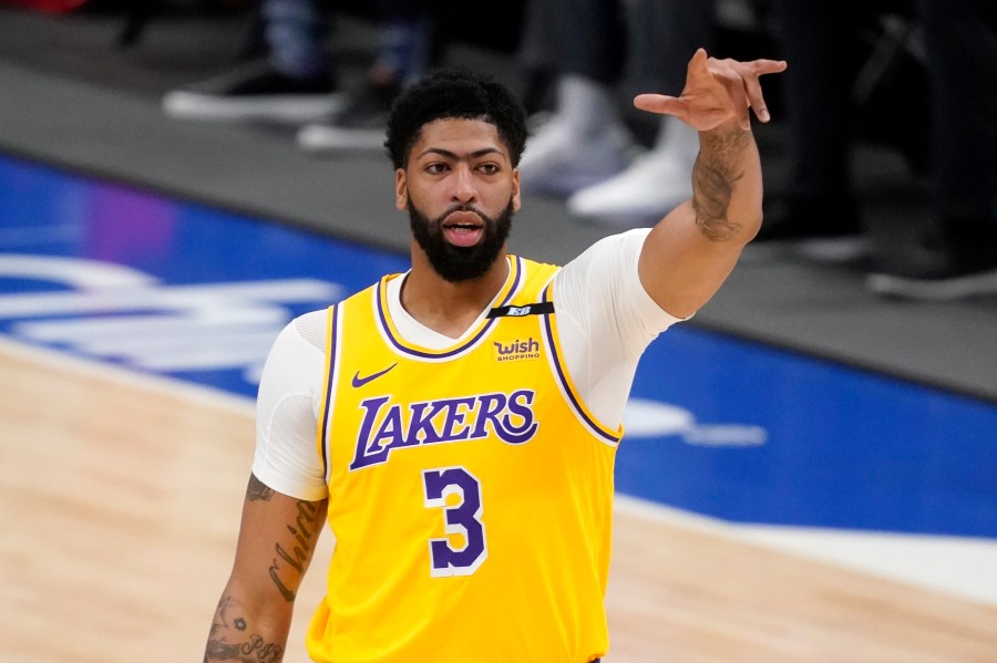 Los Angeles Lakers forward Anthony Davis gestures during the first half of the team's NBA basketball game against the Dallas Mavericks in Dallas, on April 22, 2021. (AP Photo/Tony Gutierrez)