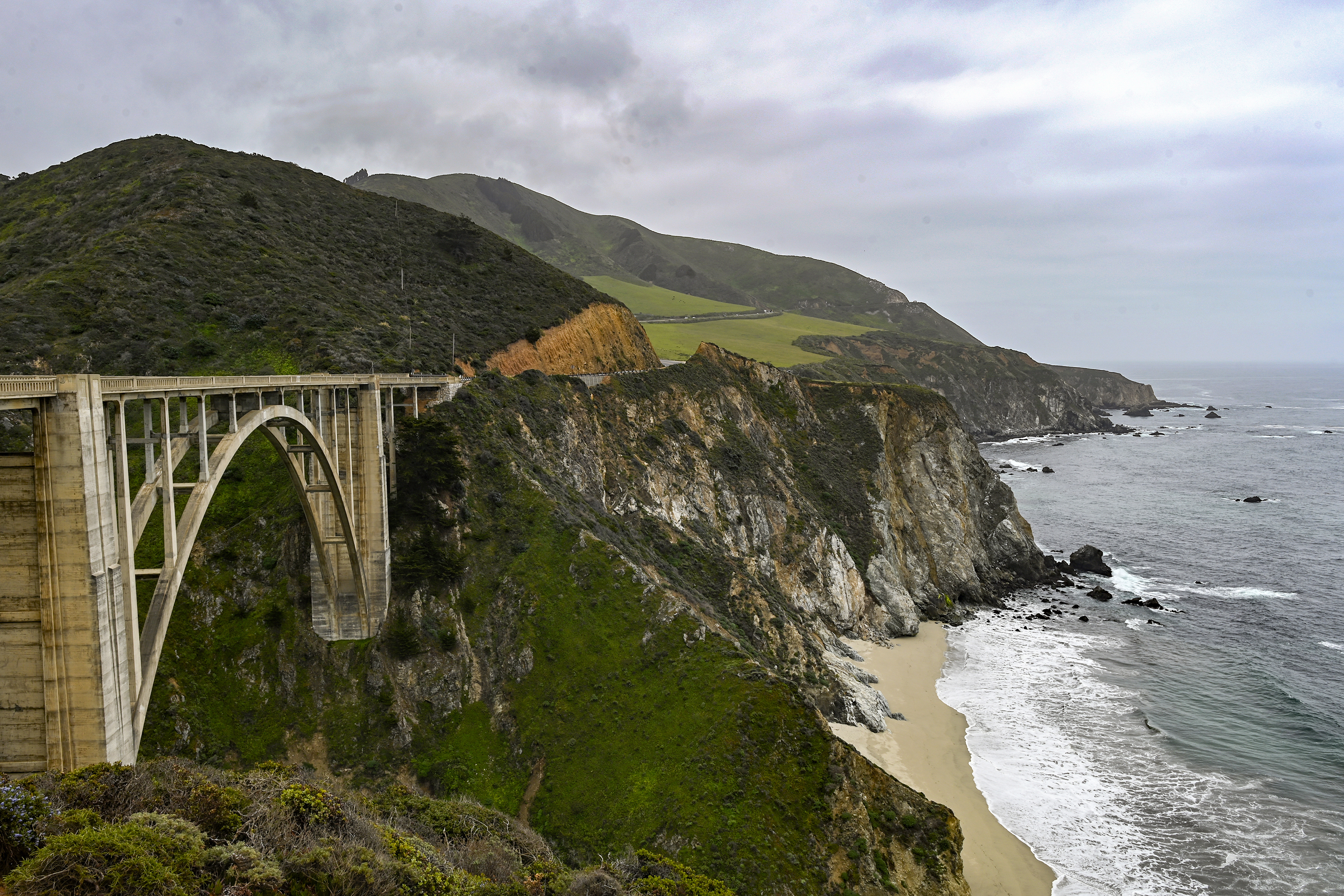 Bixby Bridge on Highway 1 near Big Sur, Calif., is seen on April 23, 2021. A section of California’s scenic Highway 1 that collapsed during a winter storm in January 2021 has reopened to traffic. (AP Photo/Nic Coury)