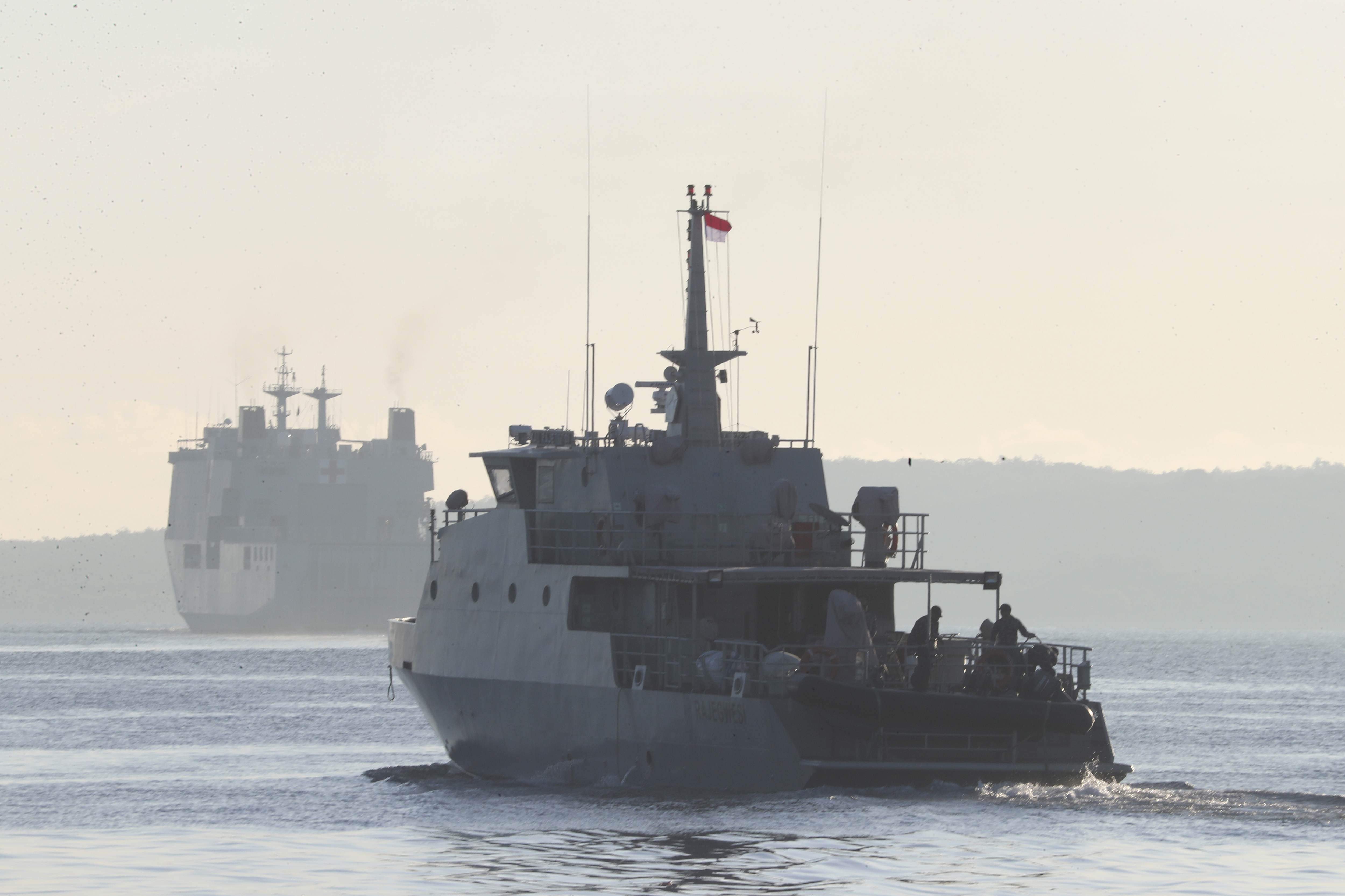 An Indonesian navy patrol ship sails to join the search for submarine KRI Nanggala that went missing while participating in a training exercise on Wednesday, off Banyuwangi, East Java, Indonesia, Saturday, April 24, 2021. (AP Photo/Achmad Ibrahim)