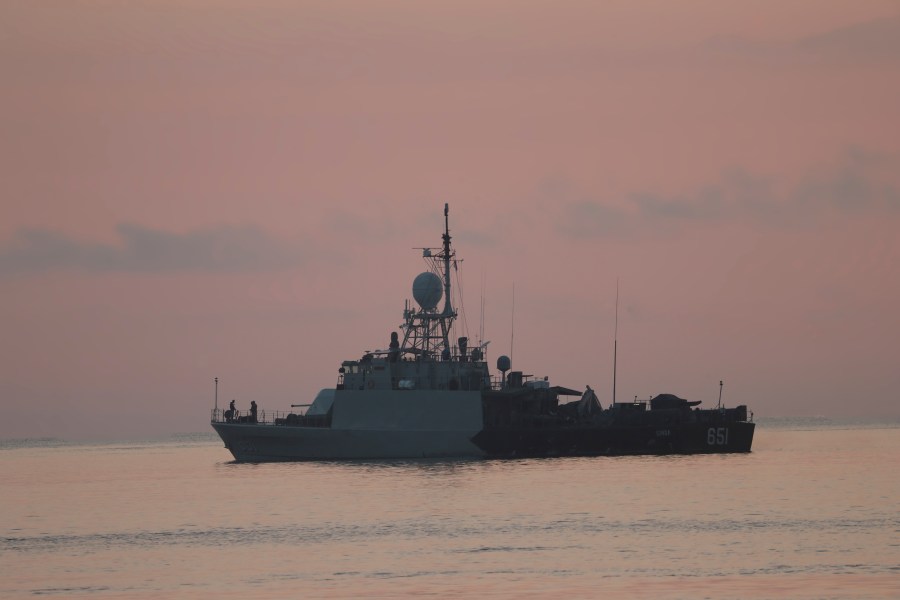 An Indonesian navy patrol ship sails to join the search for submarine KRI Nanggala that went missing while participating in a training exercise on Wednesday, off Banyuwangi, East Java, Indonesia Sunday, April 25, 2021. (AP Photo/Achmad Ibrahim)