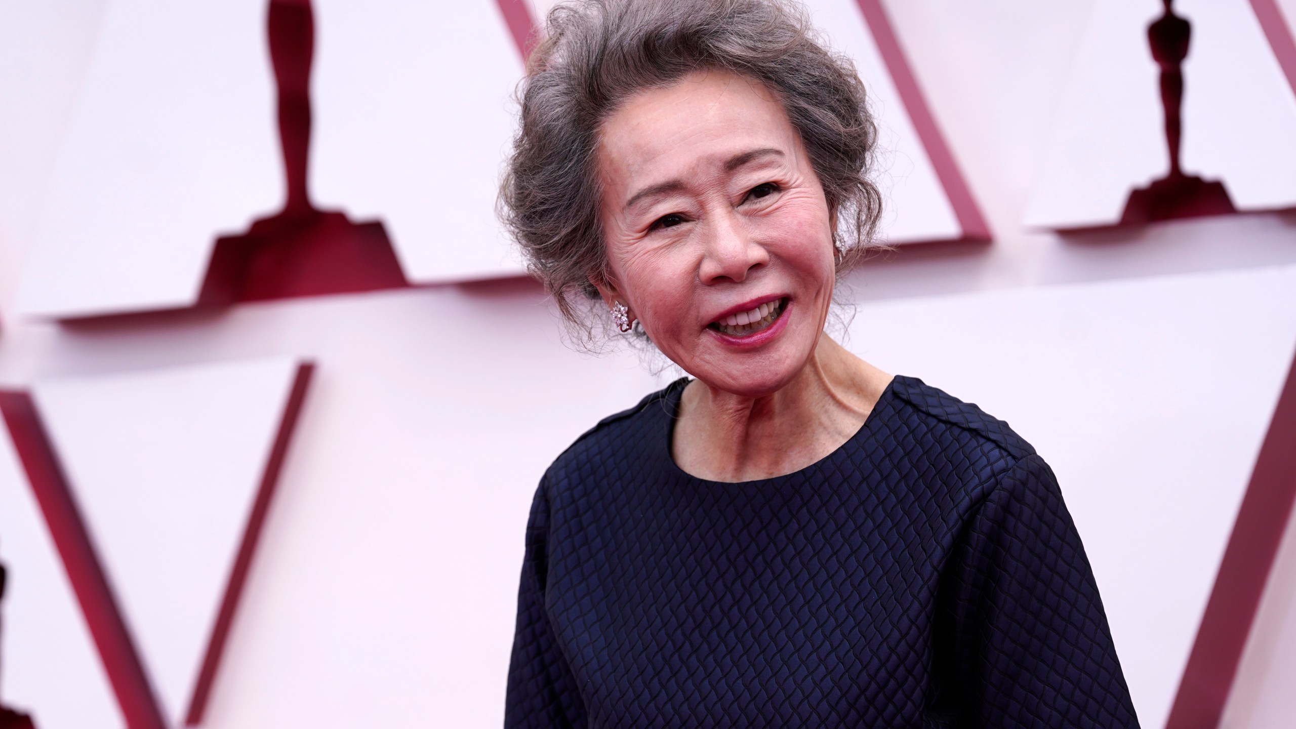 Youn Yuh-jung arrives at the Oscars on Sunday, April 25, 2021, at Union Station in Los Angeles. (AP Photo/Chris Pizzello, Pool)