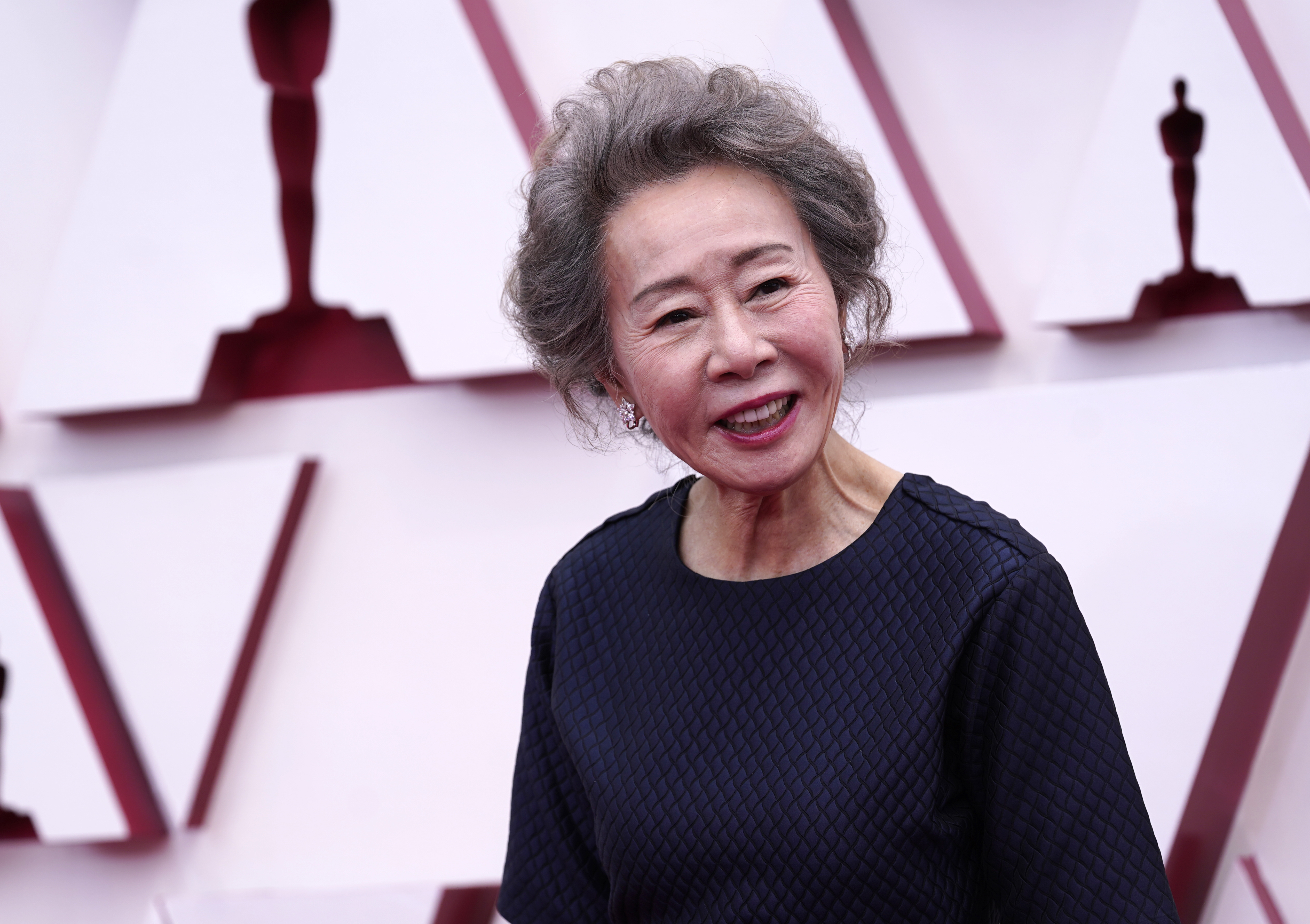 Youn Yuh-jung arrives at the Oscars on Sunday, April 25, 2021, at Union Station in Los Angeles. (AP Photo/Chris Pizzello, Pool)