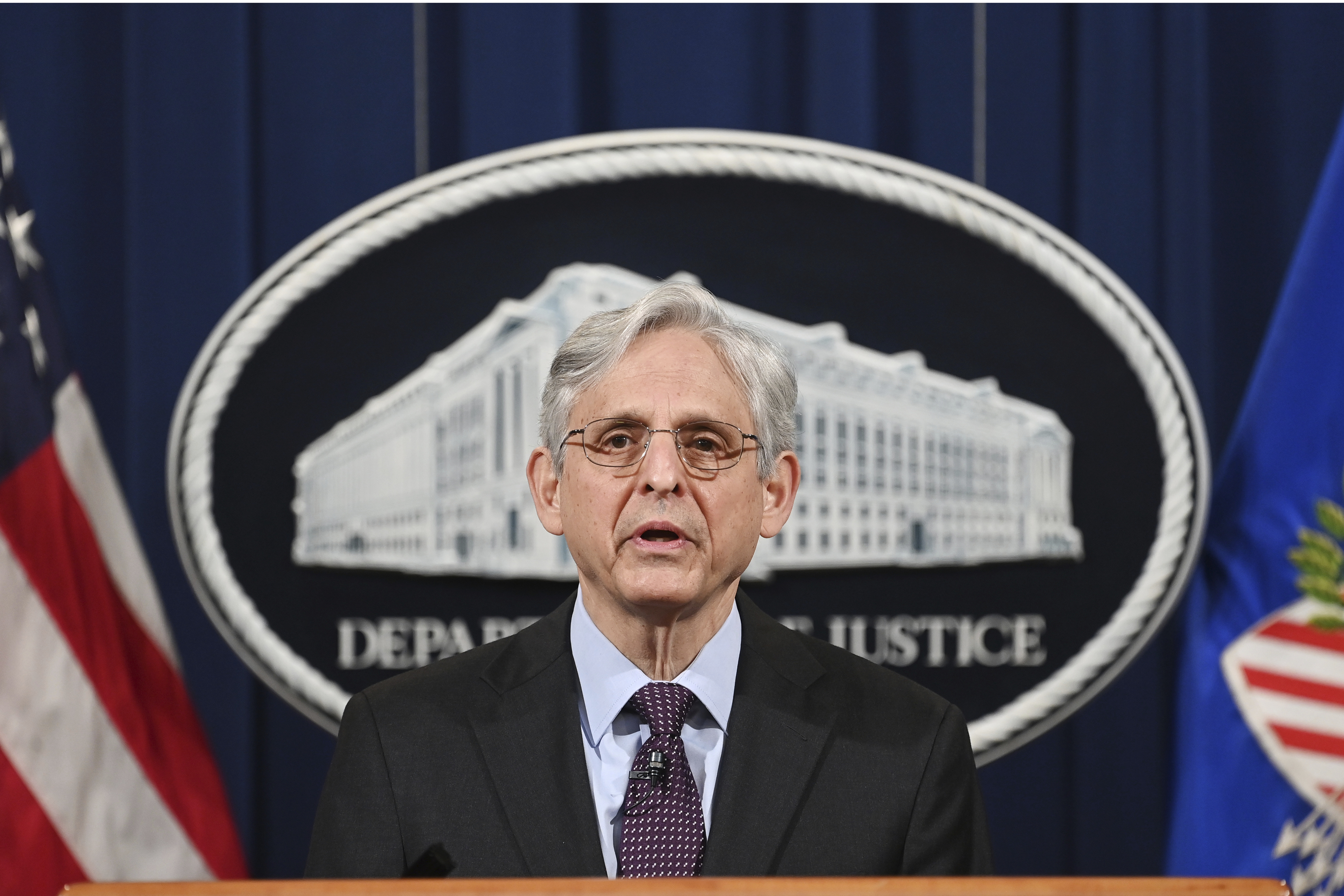 Attorney General Merrick Garland speaks at the Department of Justice in Washington on April 26, 2021. The Justice Department is opening a sweeping probe into policing in Louisville after the March 2020 death of Breonna Taylor, who was shot to death by police during a raid at her home. (Mandel Ngan/Pool via AP)