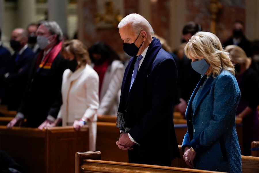 In this Wednesday, Jan. 20, 2021 file photo, President-elect Joe Biden and his wife, Jill Biden, attend Mass at the Cathedral of St. Matthew the Apostle during Inauguration Day ceremonies in Washington. When U.S. Catholic bishops hold their next national meeting in June 2021, they’ll be deciding whether to send a tougher-than-ever message to President Joe Biden and other Catholic politicians: Don’t partake of Communion if you persist in public advocacy of abortion rights. (AP Photo/Evan Vucci)