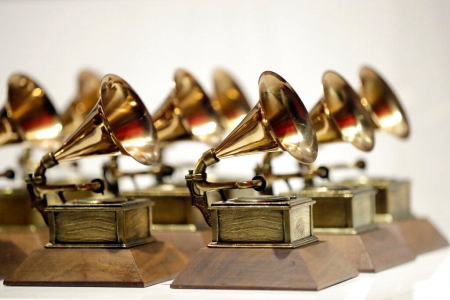 In this Oct. 10, 2017, file photo, various Grammy Awards are displayed at the Grammy Museum Experience at Prudential Center in Newark, N.J. (AP Photo/Julio Cortez, File)