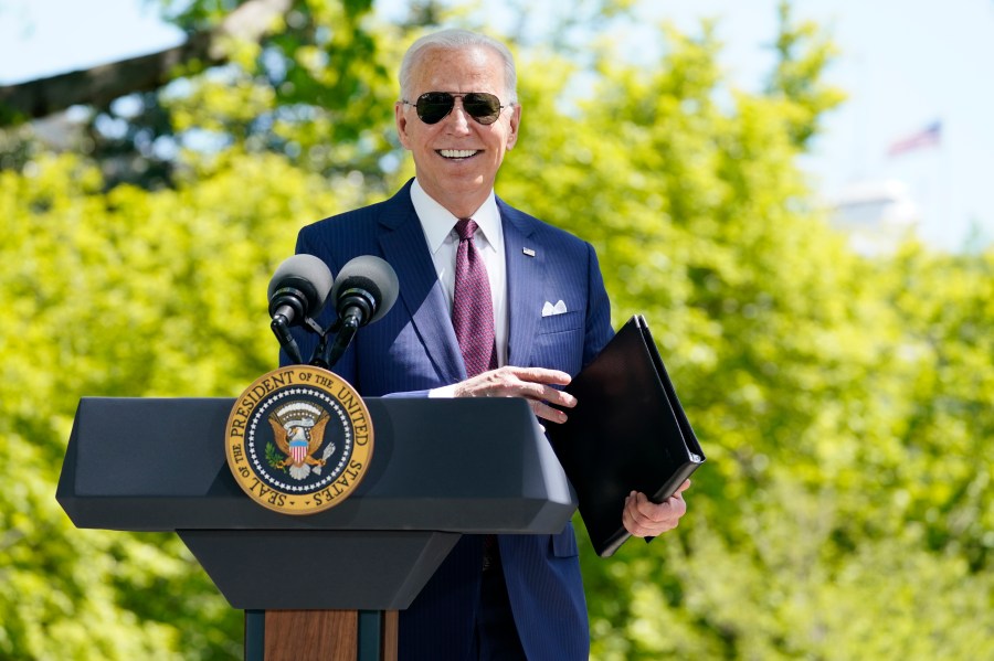 President Joe Biden responds to a question from reporters about COVID-19, on the North Lawn of the White House on April 27, 2021, in Washington. (AP Photo/Evan Vucci)