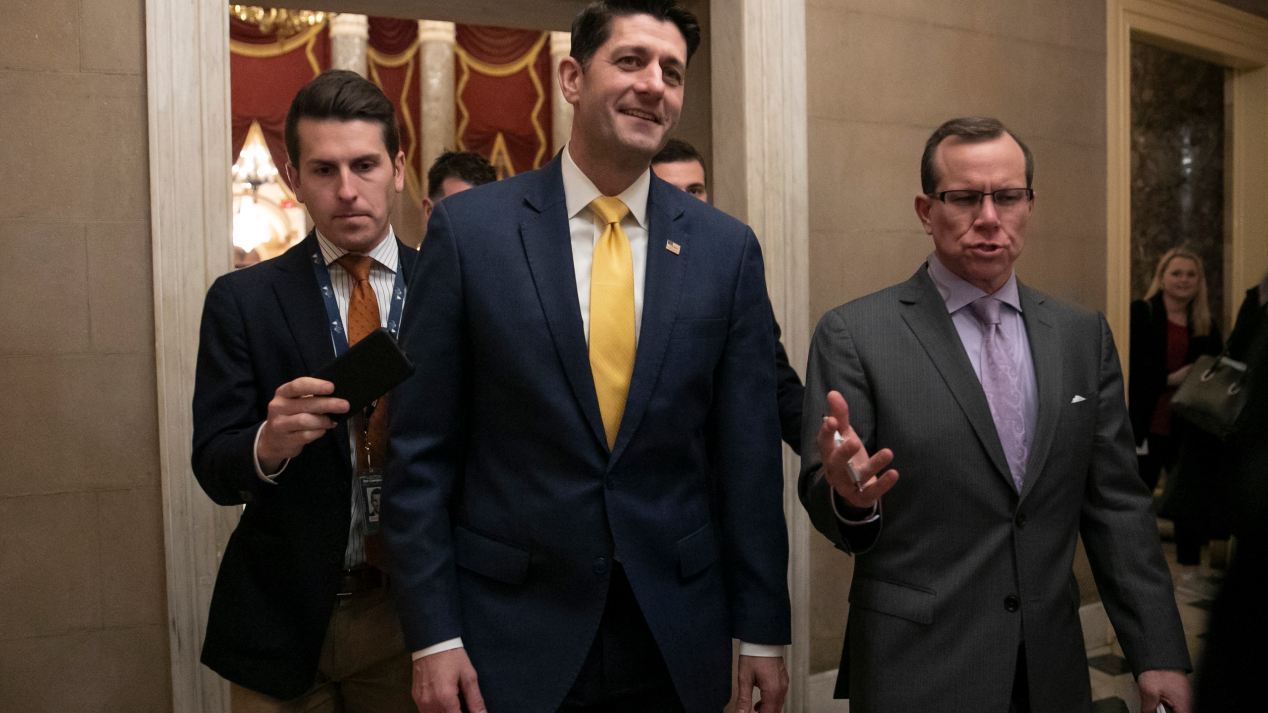 In this Dec. 20, 2018 file photo House Speaker Paul Ryan leaves the chamber after the Republican-led House approved funding for President Donald Trump's border wall at the Capitol in Washington. Ryan thinks his divided party, and history, will move on since the chaotic end of Donald Trump's presidency. The either-or debate over fealty to Trump "is going to fade," the 2012 Republican vice presidential candidate said in an interview. "I think circumstances, ideas and new candidates are going to overshadow that whole conversation." (AP Photo/J. Scott Applewhite,File)