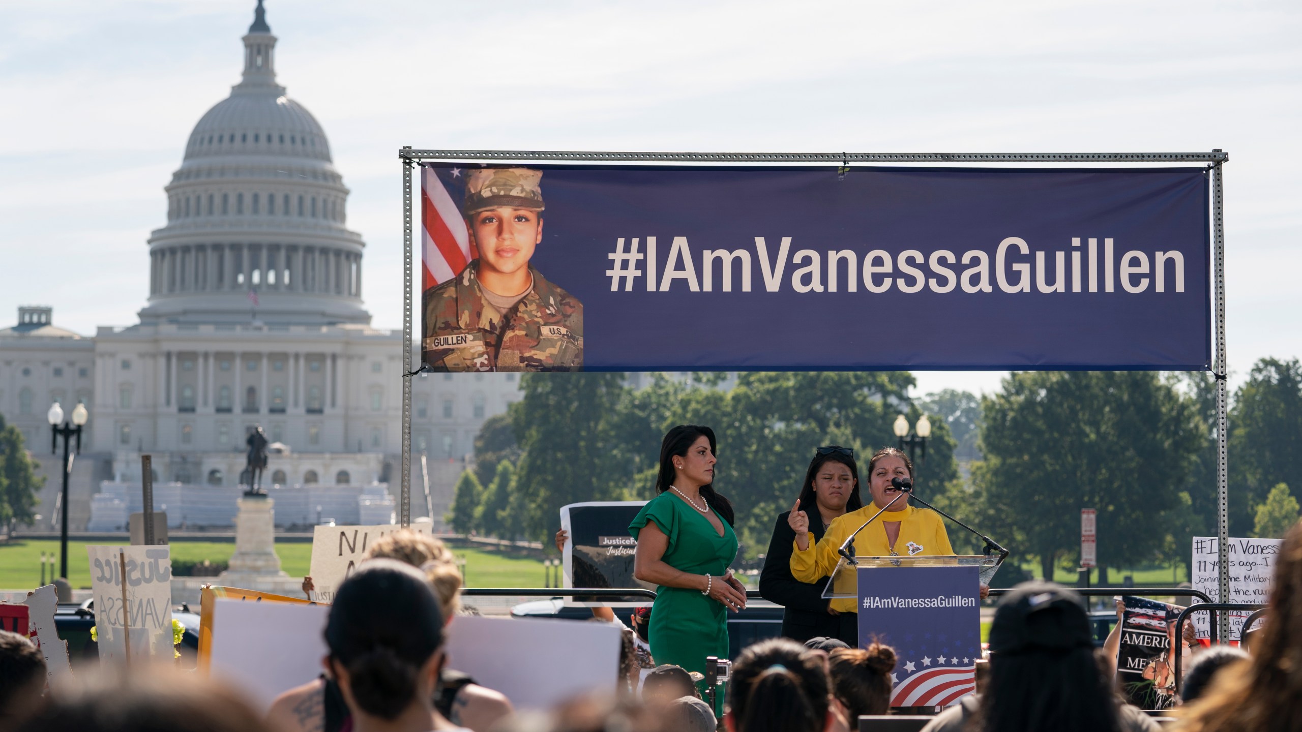 In this July 30, 2020, file photo slain Army Spc. Vanessa Guillen's mother Gloria Guillen, right, joined by Vanessa's sister Lupe Guillen, center, and family attorney Natalie Khawam, speaks as she cries during a news conference on the National Mall in front of Capitol Hill in Washington. (AP Photo/Carolyn Kaster, File)