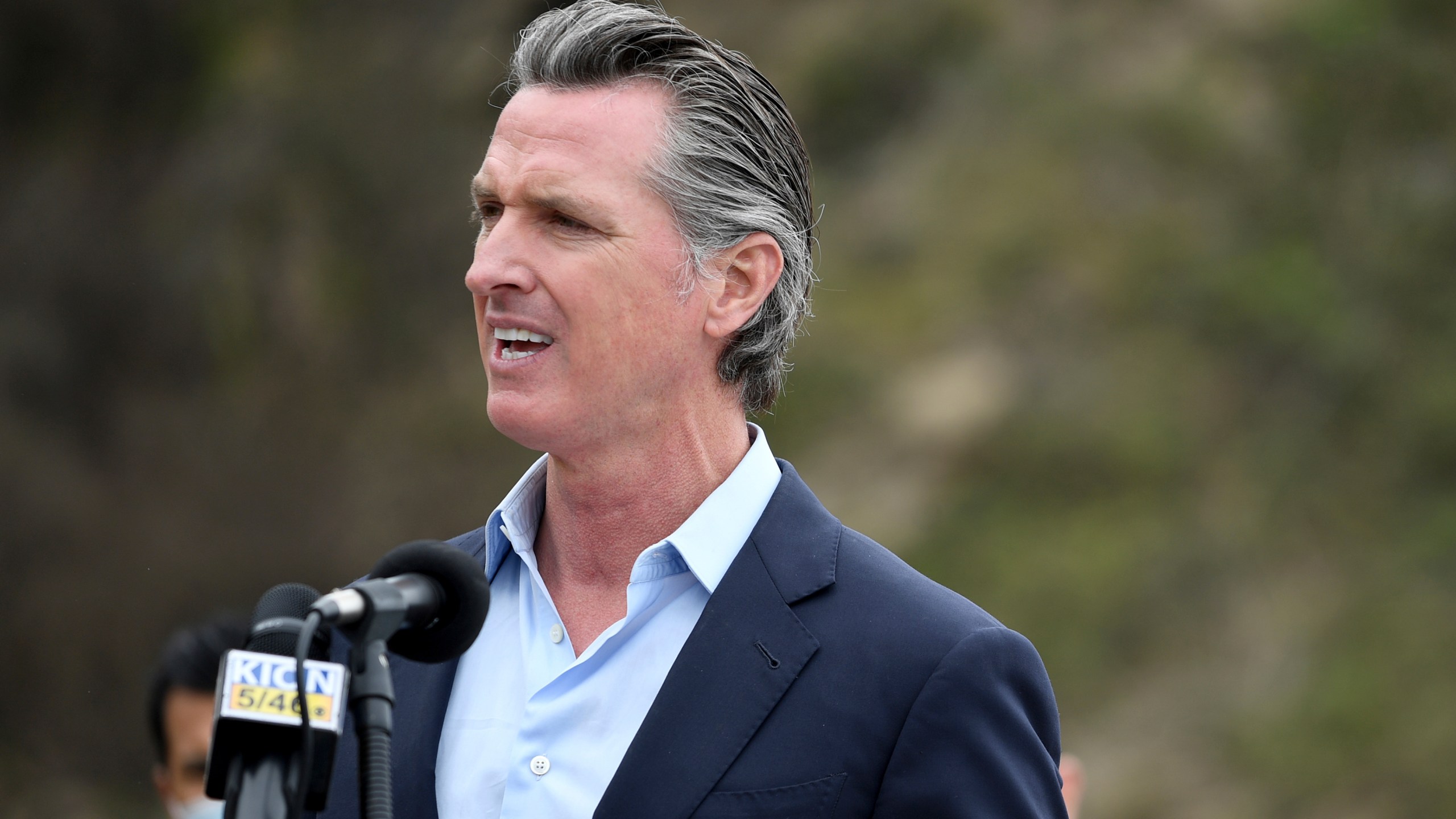 In this April 23, 2021, file photo, California Gov. Gavin Newsom speaks during a press conference in Big Sur, Calif. California on Saturday is increasing early release credits for tens of thousands of inmates including violent and repeat felons as it further trims the population of what once was the nation's largest state correctional system. Officials announced in mid-April that they will close a second prison as a result of the dwindling population, fulfilling a promise by Newsom. (AP Photo/Nic Coury, File)