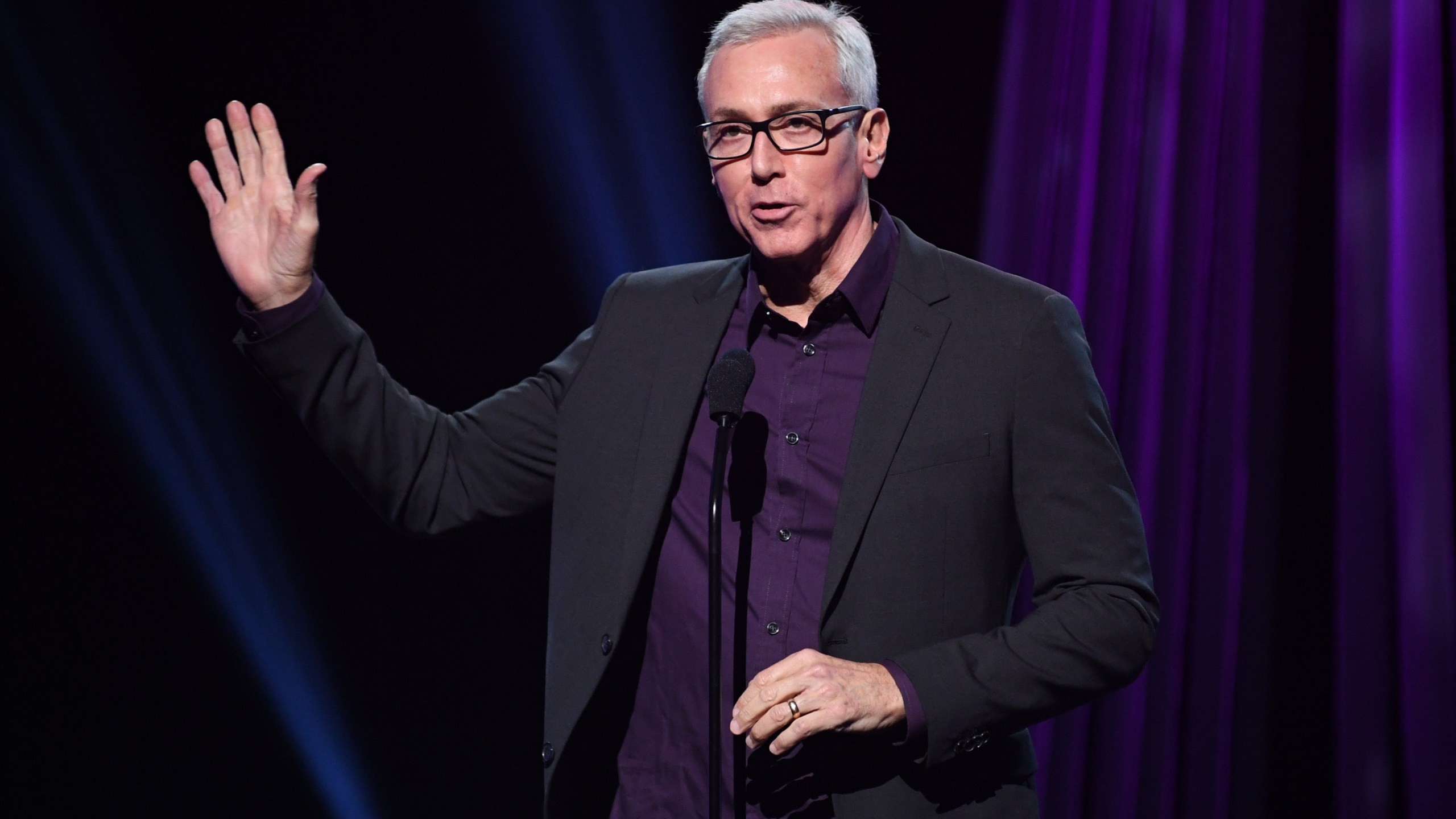 Drew Pinsky speaks onstage at the 2019 iHeartRadio Podcast Awards Presented by Capital One at the iHeartRadio Theater LA on Jan. 18, 2019, in Burbank, California. (Kevin Winter/Getty Images for iHeartMedia)