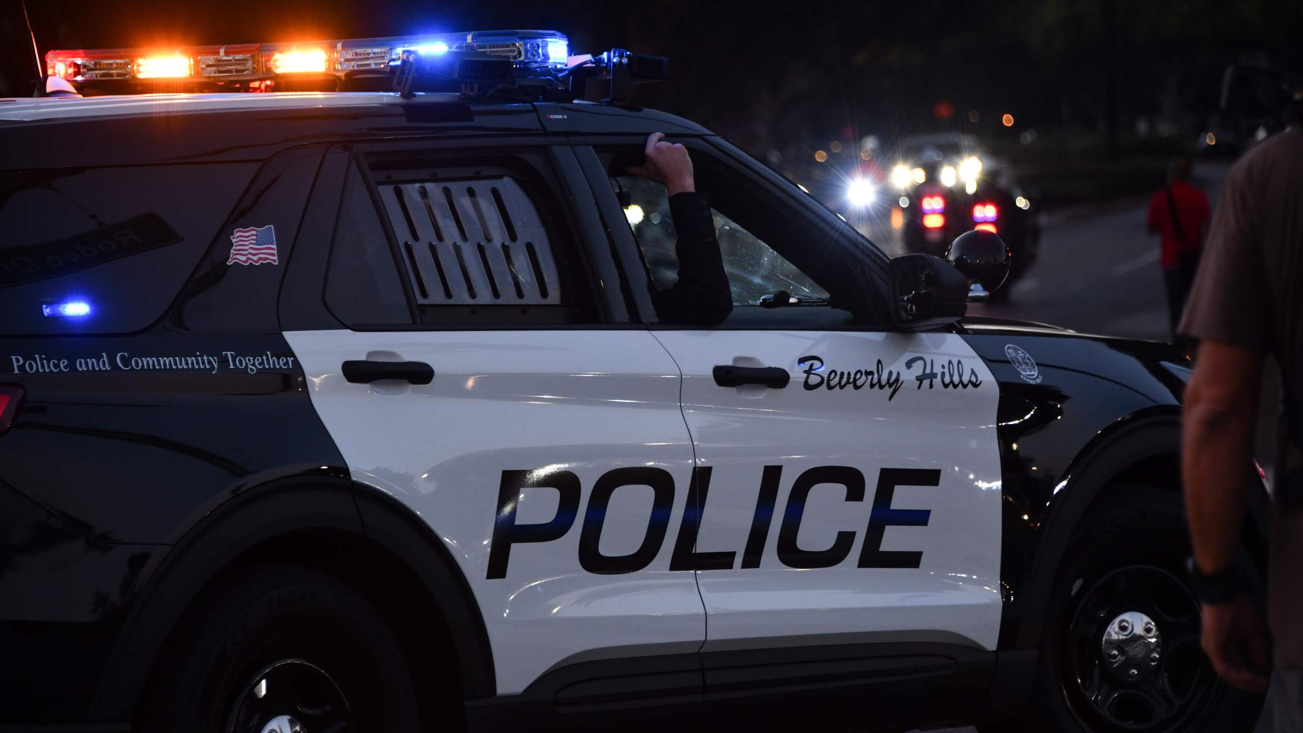 Beverly Hills police officers patrol in their car on November 1, 2020 in Beverly Hills. (Photo by Chris Delmas/AFP via Getty Images)