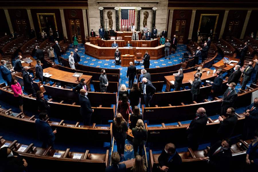 Electoral college votes are brought in before House Speaker Nancy Pelosi and Vice President Mike Pence resume presiding over a Joint session of Congress to certify the 2020 Electoral College results after supporters of President Donald Trump stormed the Capitol earlier in the day on Capitol Hill in Washington, DC on January 6, 2021. (ERIN SCHAFF/POOL/AFP via Getty Images)