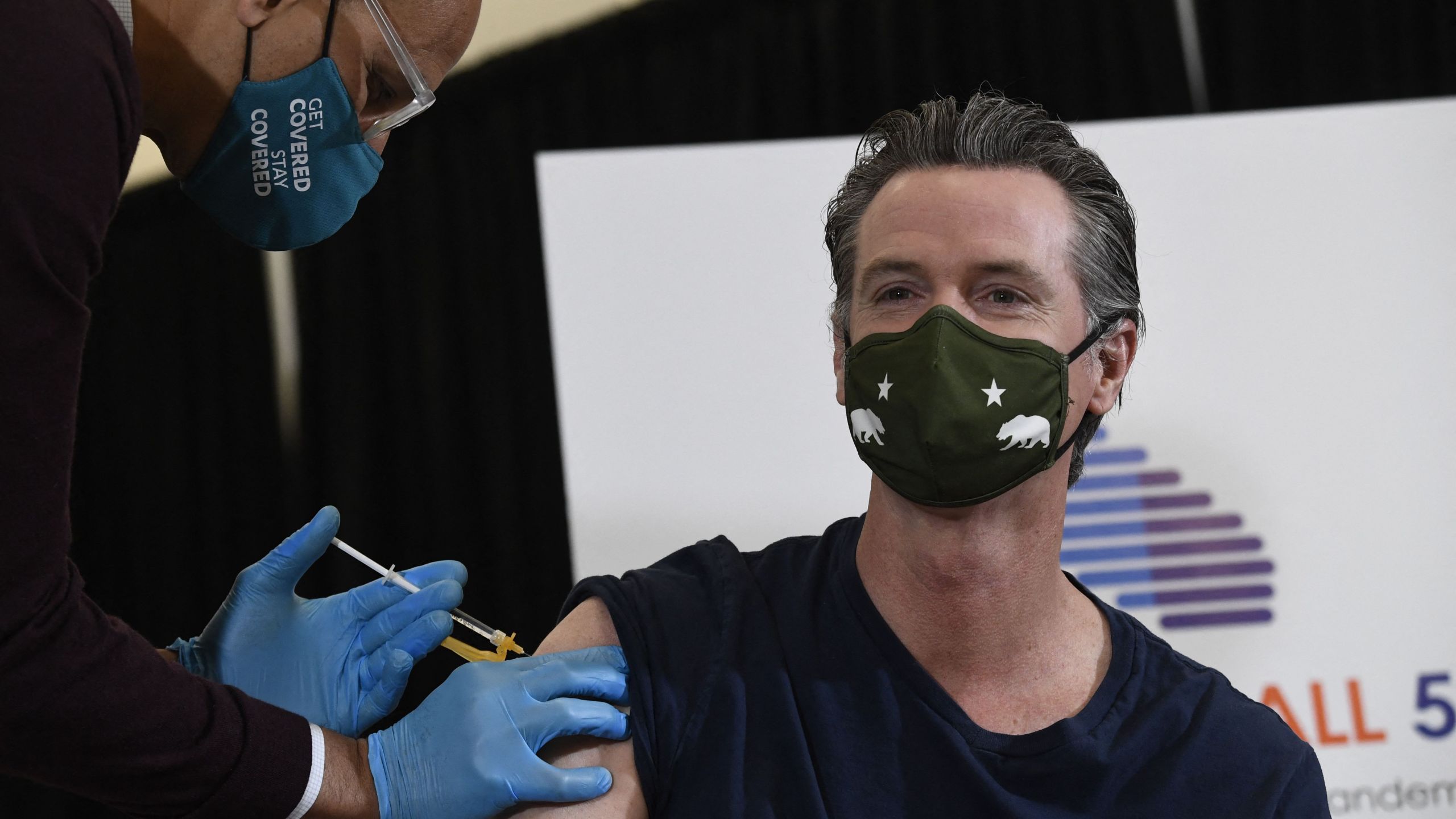 California Governor Gavin Newsom D-CA receives his dose of the Johnson & Johnson Covid-19 vaccine from Dr. Mark Ghaly in Los Angeles, California on April 1, 2021.(Patrick T. Fallon/AFP via Getty Images)