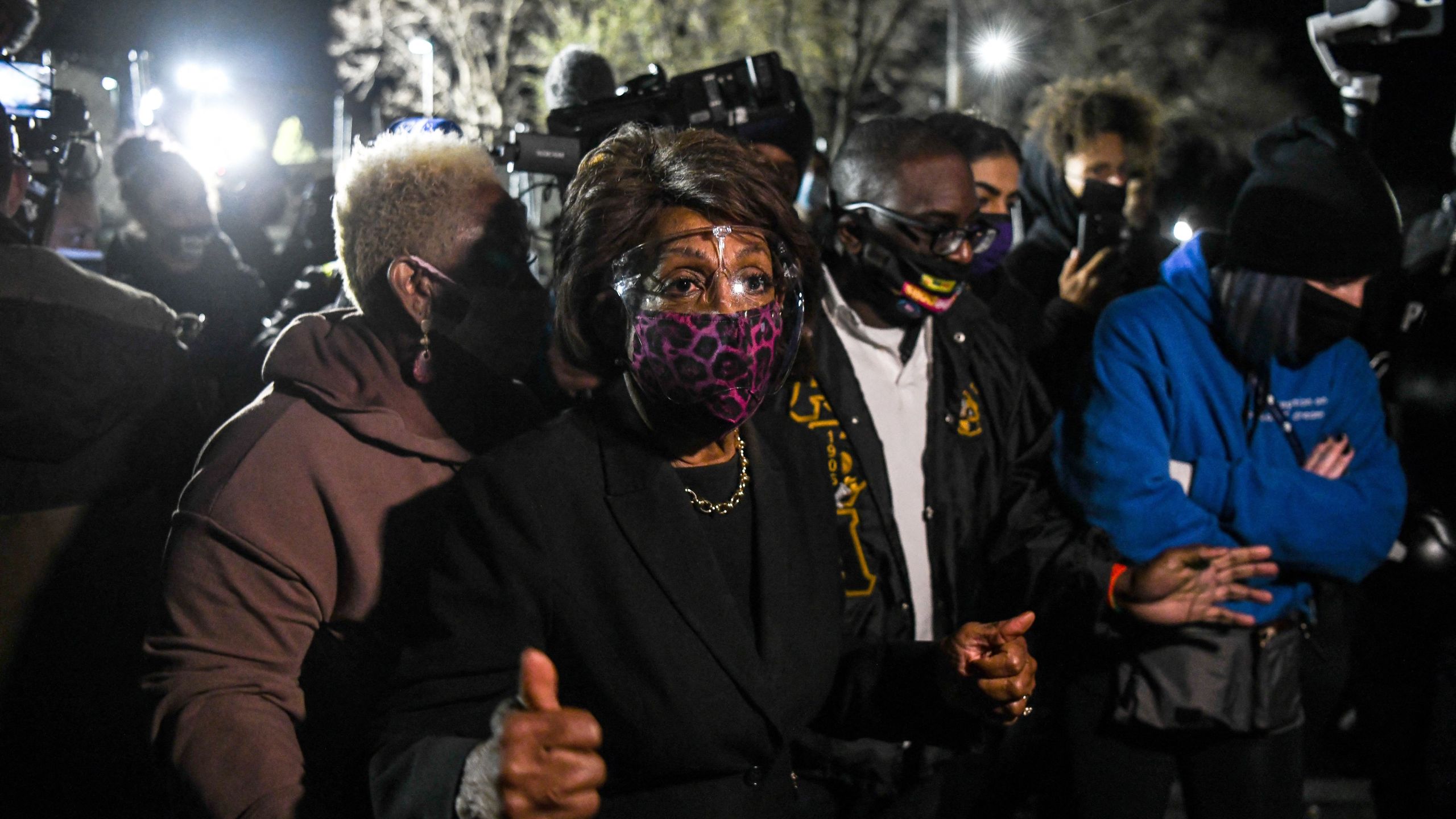 Rep. Maxine Waters (D-CA) speaks to reporters during a protest at the Brooklyn Center Police Department in Brooklyn Centre, Minn. on April 17, 2021. Police Officer Kim Potter, who shot dead 20-year-old Daunte Wright in a Minneapolis suburb after appearing to mistake her gun for her Taser, was arrested April 14 on manslaughter charges. (CHANDAN KHANNA / AFP via Getty Images)