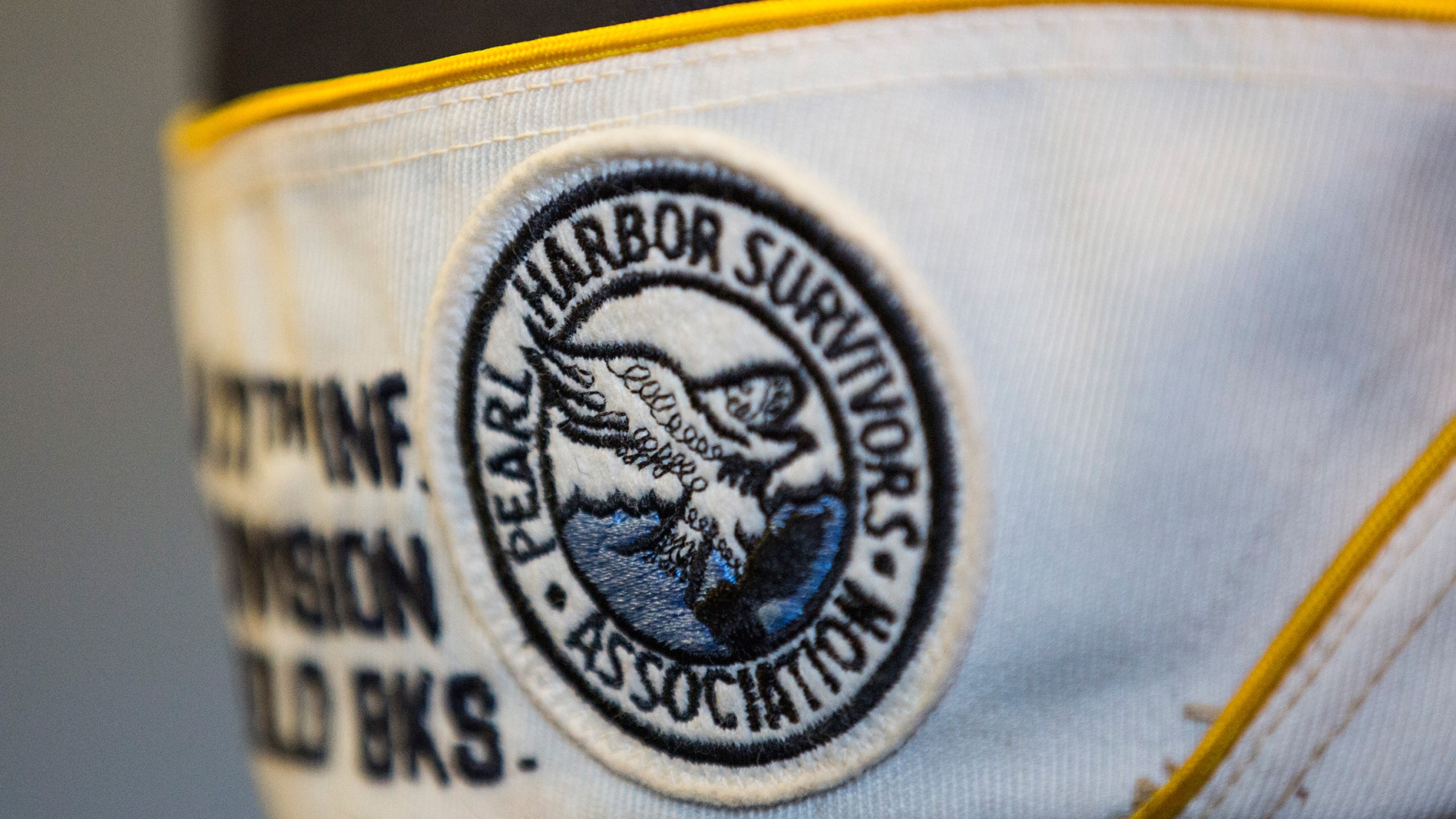 Detail of the hat of a survivor of the attack on Pearl Harbor as he attends a ceremony marking the anniversary of the attack on the Intrepid Sea, Air and Space Museum on December 7, 2015 in New York City. (Andrew Burton/Getty Images)