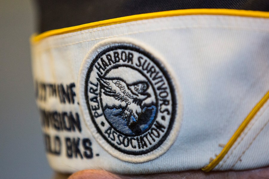 Detail of the hat of a survivor of the attack on Pearl Harbor as he attends a ceremony marking the anniversary of the attack on the Intrepid Sea, Air and Space Museum on December 7, 2015 in New York City. (Andrew Burton/Getty Images)