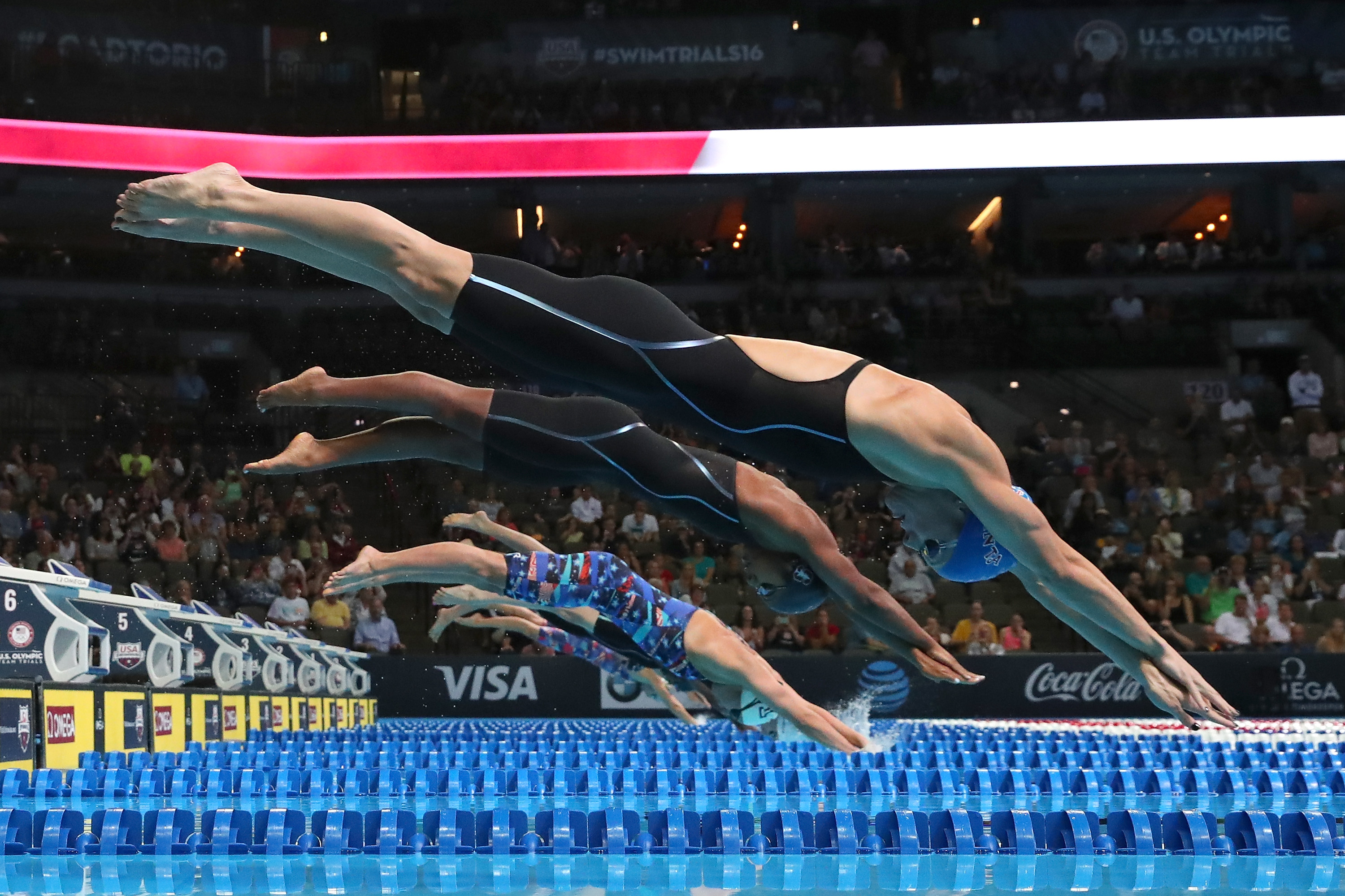 Amanda Weir, Lia Neal, Katrina Konopka, Madison Kennedy and Abbey Weitzeil of the United States dive in to compete in the final heat for the Women's 50 Meter Freestyle during Day Eight of the 2016 U.S. Olympic Team Swimming Trials at CenturyLink Center on July 3, 2016 in Omaha, Nebraska. (Tom Pennington/Getty Images)