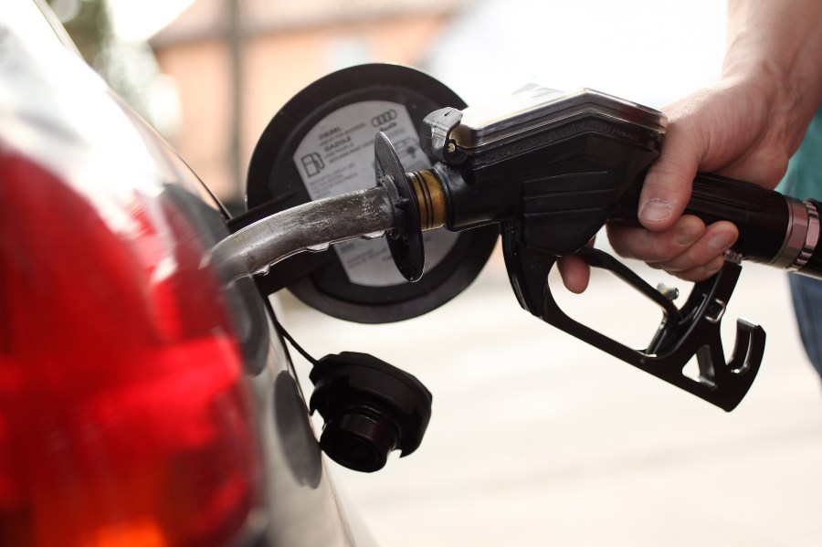 A gasoline station attendant pumps diesel into a car at a filling station on March 23, 2010 in Berlin, Germany. (Photo Illustration by Sean Gallup/Getty Images)