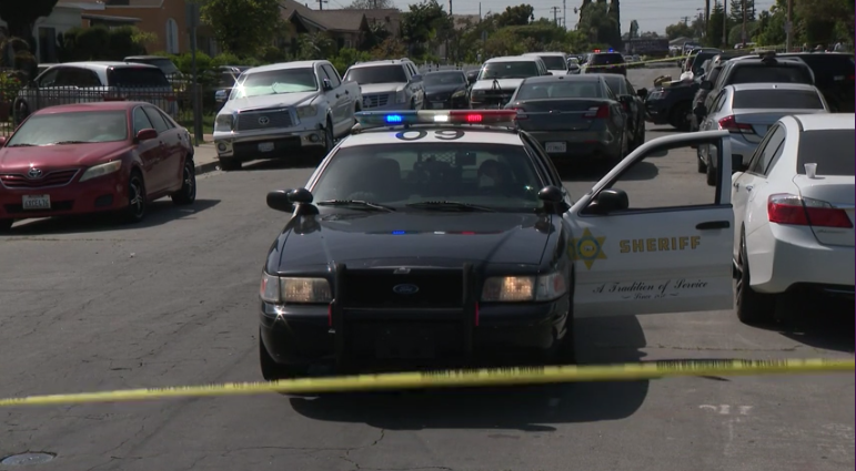 A Los Angeles County Sheriff's Department vehicle blocks the scene of a death investigation in Huntington Park on April 5, 2021. (KTLA)