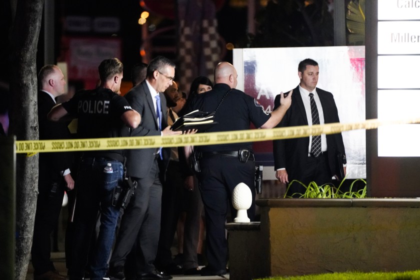 Police respond to the scene of a multiple shooting on March 31 in Orange. In response to recent mass shootings, California lawmakers want to tax guns to pay for anti-violence programs.(Kent Nishimura / Los Angeles Times)