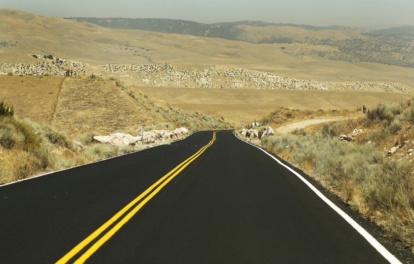 A newly paved road goes through the sprawling grasslands of Tejon Ranch, about 70 miles north of Los Angeles. Plans to build a massive development in the area received a legal setback in early April 2021. (Los Angeles Times)