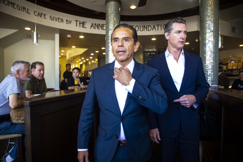 Former Mayor Antonio Villaraigosa and then-Lt. Gov. Gavin Newsom at a June 2018 news conference in front of Homegirl Cafe in Los Angeles.(Los Angeles Times)