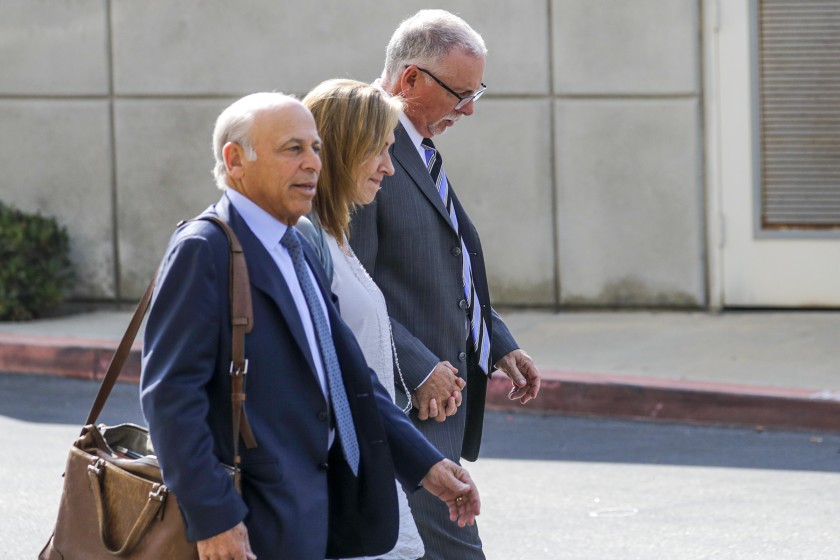 Former UCLA gynecologist Dr. James M. Heaps (right) leaves leaves Airport Superior Court in Los Angeles in 2019. (Irfan Khan / Los Angeles Times)