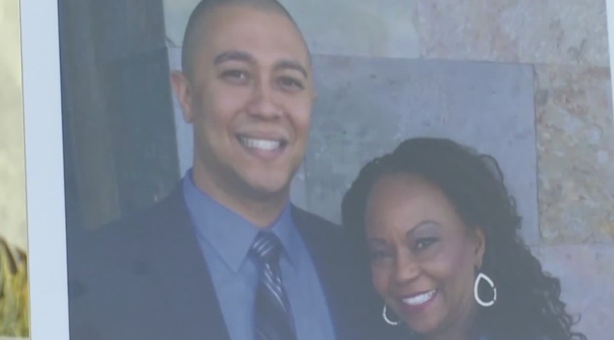 Christoper Eisinger appears alongside his mother in a photo seen at a news conference in Anaheim. He died days after an encounter with Anaheim police on March 2, 2018. On April 29, 2021, an Orange County jury awarded his family $2.2 million, determining that officers used unreasonable force and did cause his death.