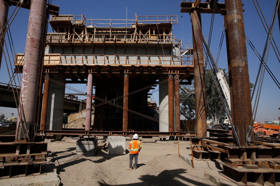 The high-speed rail viaduct that will cross over Highway 99 is seen under construction in Fresno on Oct. 9, 2019. (Rich Pedroncelli / Associated Press)