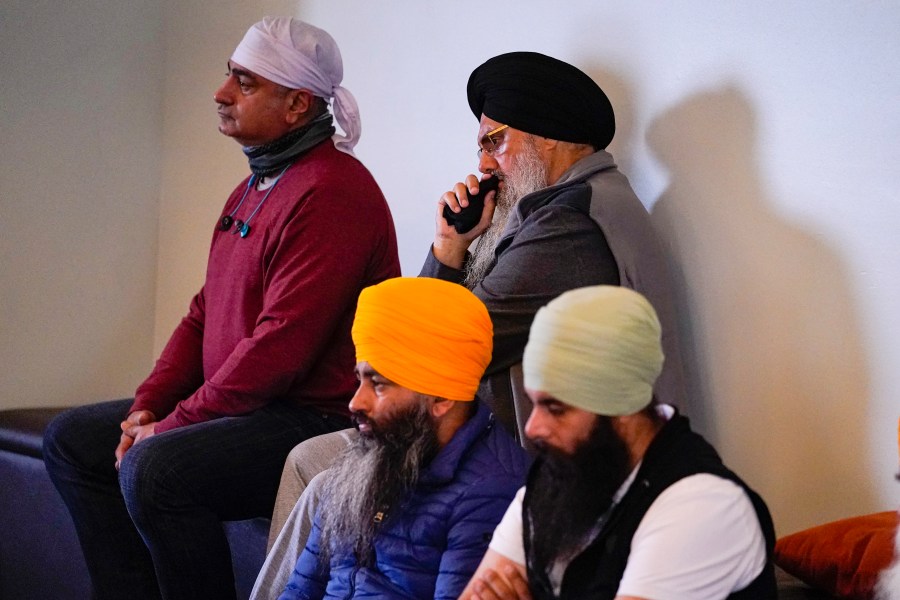 Members of the Sikh Coalition gather at the Sikh Satsang of Indianapolis in Indianapolis, Saturday, April 17, 2021 to formulate the groups response to the shooting at a FedEx facility in Indianapolis that claimed the lives of four members of the Sikh community. A gunman killed eight people and wounded several others before taking his own life in a late-night attack at a FedEx facility near the Indianapolis airport. (AP Photo/Michael Conroy)