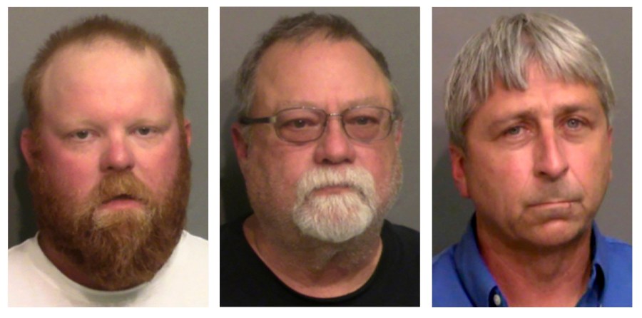 This combo of booking photos shows from left, Travis McMichael, his father Gregory McMichael, and William "Roddie" Bryan Jr. The Justice Department announced federal hate crime charges against the three men on April 28,2021, in the death of Ahmaud Arbery, a Georgia man who was killed while out for a run last year. (Glynn County Detention Center via AP)