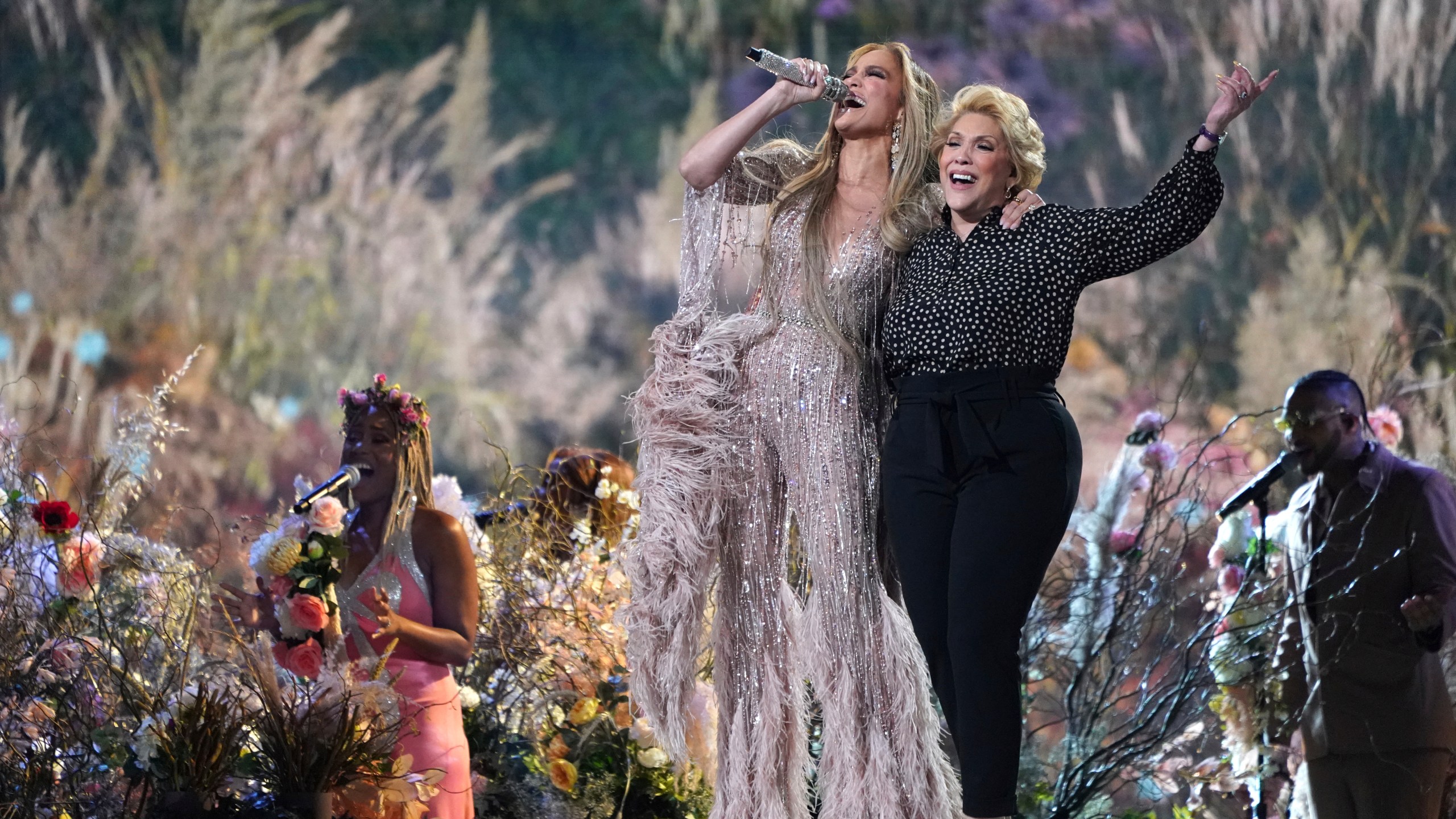 Jennifer Lopez performs with her mother, Guadalupe Rodríguez, at "Vax Live: The Concert to Reunite the World" on Sunday, May 2, 2021, at SoFi Stadium in Inglewood, Calif. (Photo by Jordan Strauss/Invision/AP)