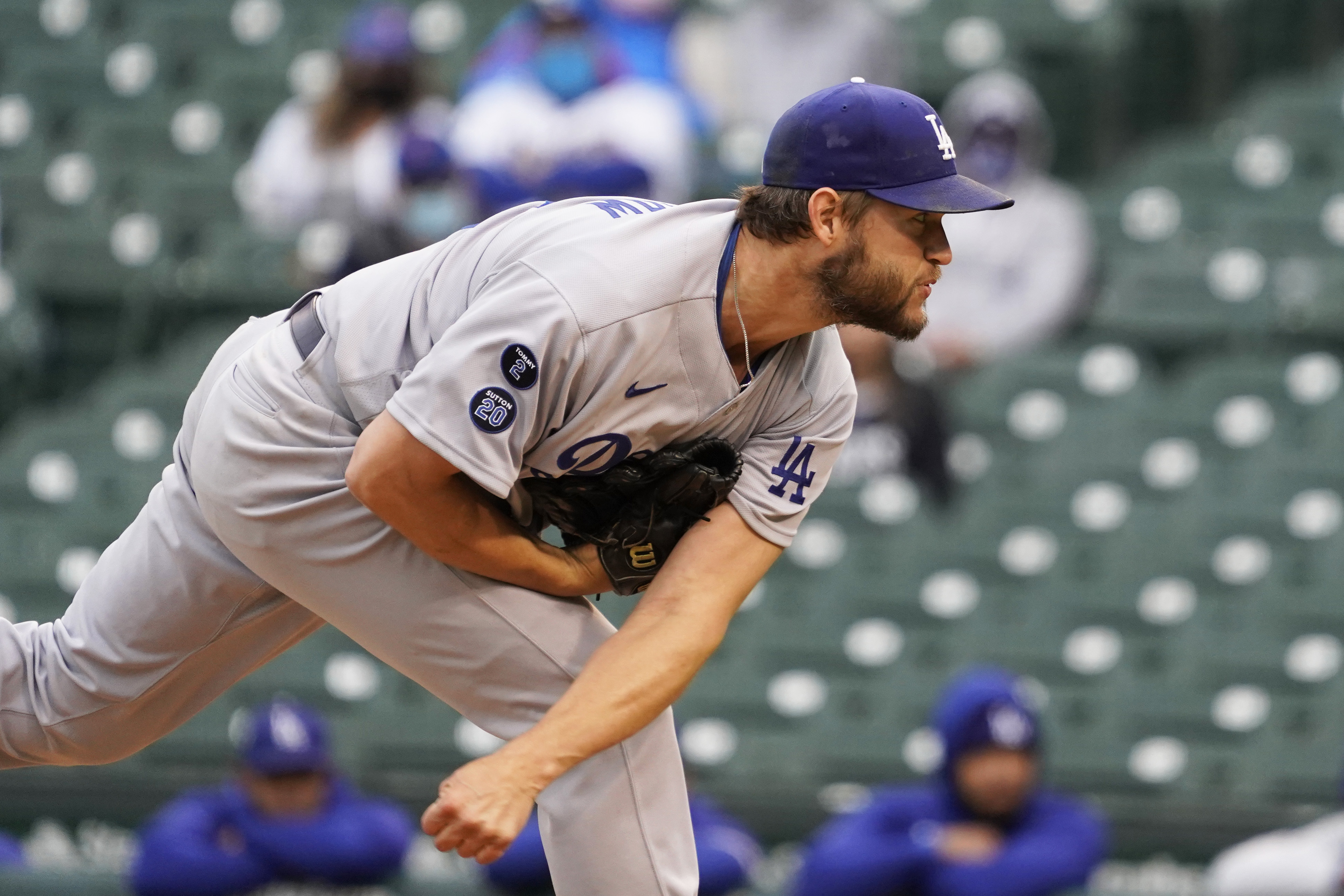 Los Angeles Dodgers starting pitcher Clayton Kershaw throws the ball against the Chicago Cubs during the first inning of the first baseball game of a doubleheader Tuesday, May, 4, 2021, in Chicago. (AP Photo/David Banks)