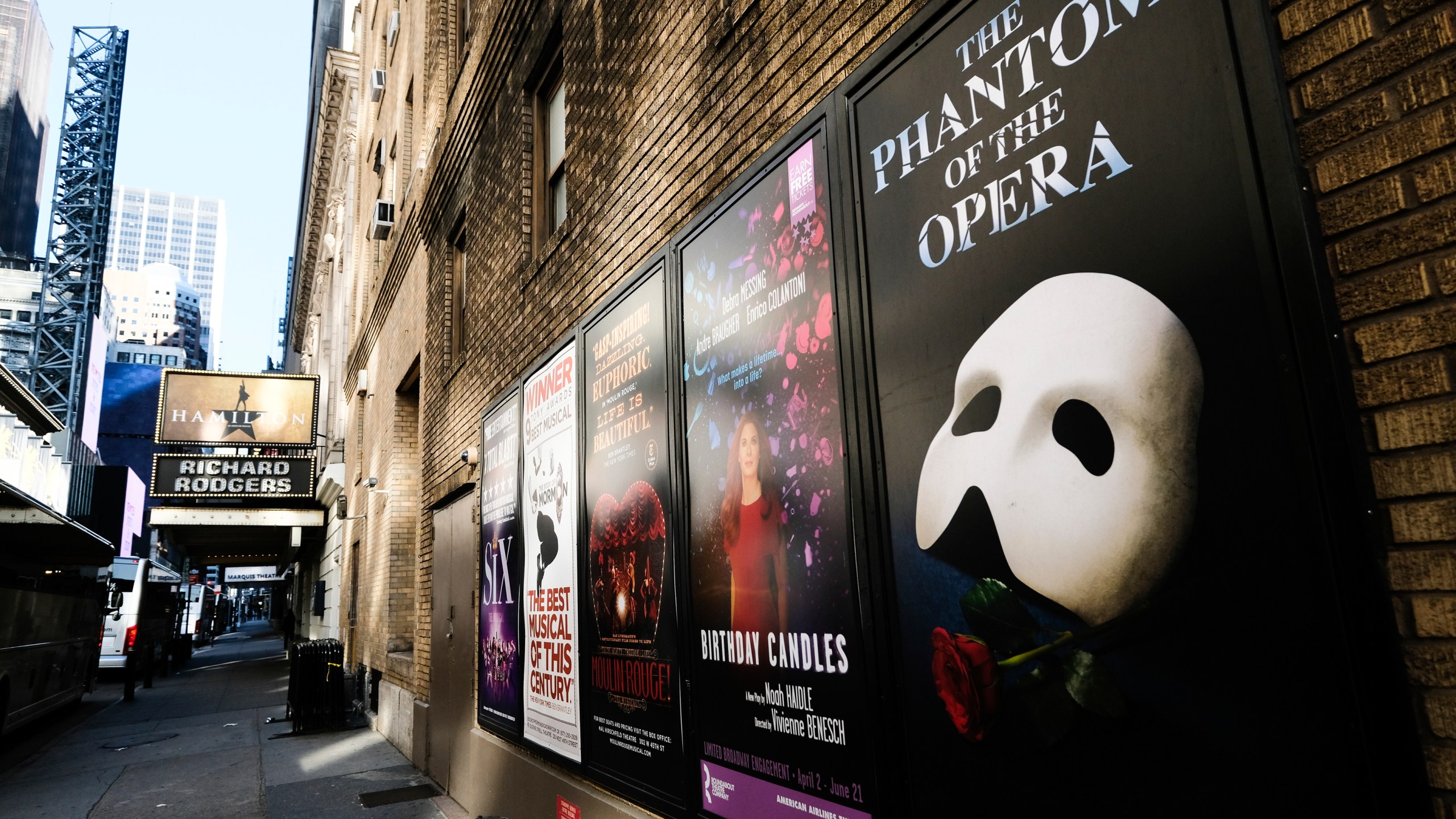 Broadway posters hang outside the Richard Rodgers Theatre during Covid-19 lockdown in New York on May 13, 2020. Many Broadway productions are scrambling to resume ticket sales to welcome theater-goers this fall after city and state leaders have green-lit a reopening of the Great White Way at full capacity. Gov. Andrew Cuomo said Broadway theaters can reopen Sept. 14 and will be allowed to decide their own entry requirements. (Photo by Evan Agostini/Invision/AP, File)