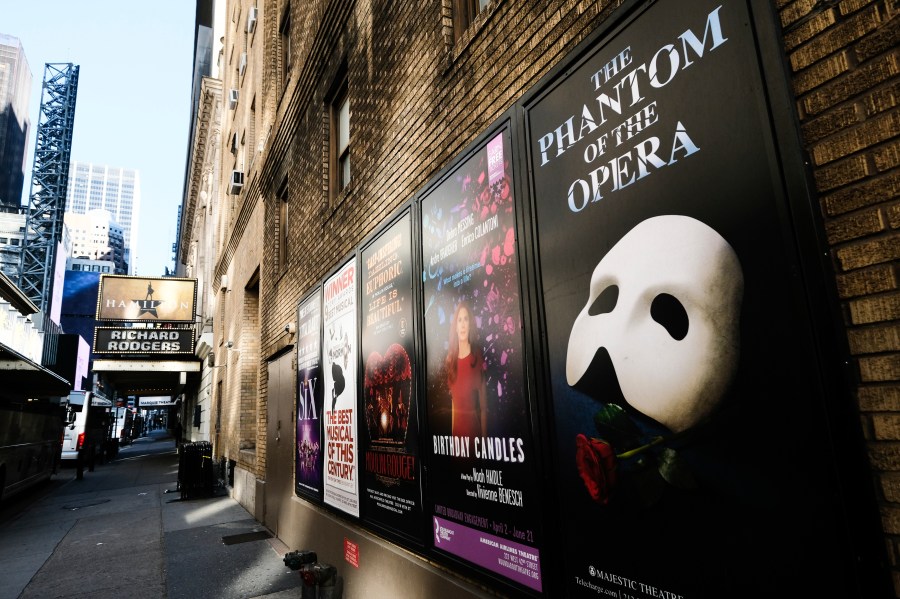 Broadway posters hang outside the Richard Rodgers Theatre during Covid-19 lockdown in New York on May 13, 2020. Many Broadway productions are scrambling to resume ticket sales to welcome theater-goers this fall after city and state leaders have green-lit a reopening of the Great White Way at full capacity. Gov. Andrew Cuomo said Broadway theaters can reopen Sept. 14 and will be allowed to decide their own entry requirements. (Photo by Evan Agostini/Invision/AP, File)