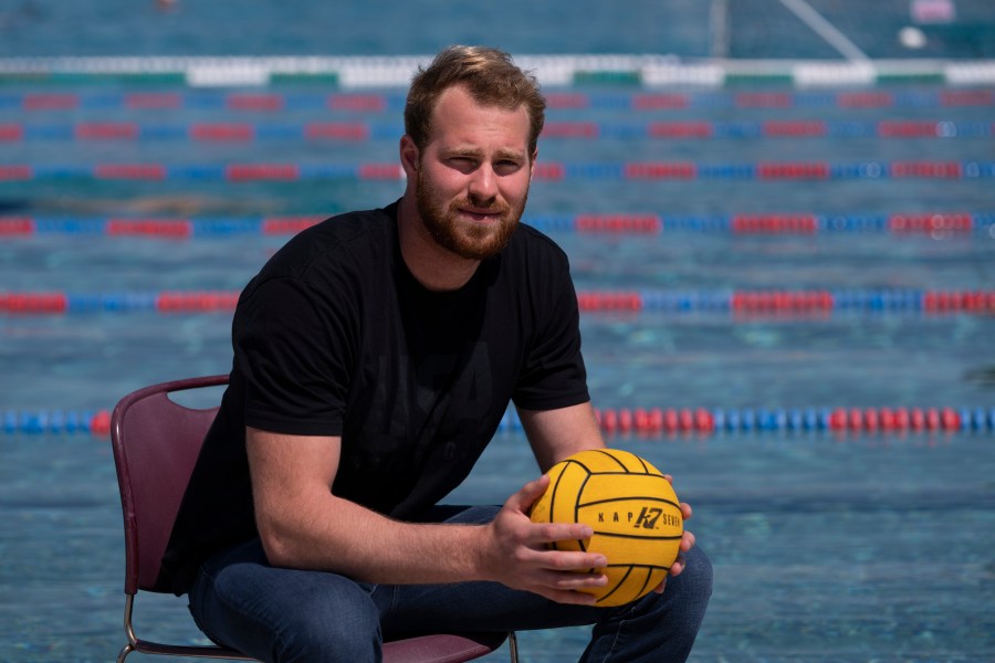 Water polo player Marko Vavic poses for photos at MWR Aquatic Training Center in Los Alamitos, Calif., on April 27, 2021. (AP Photo/Jae C. Hong)