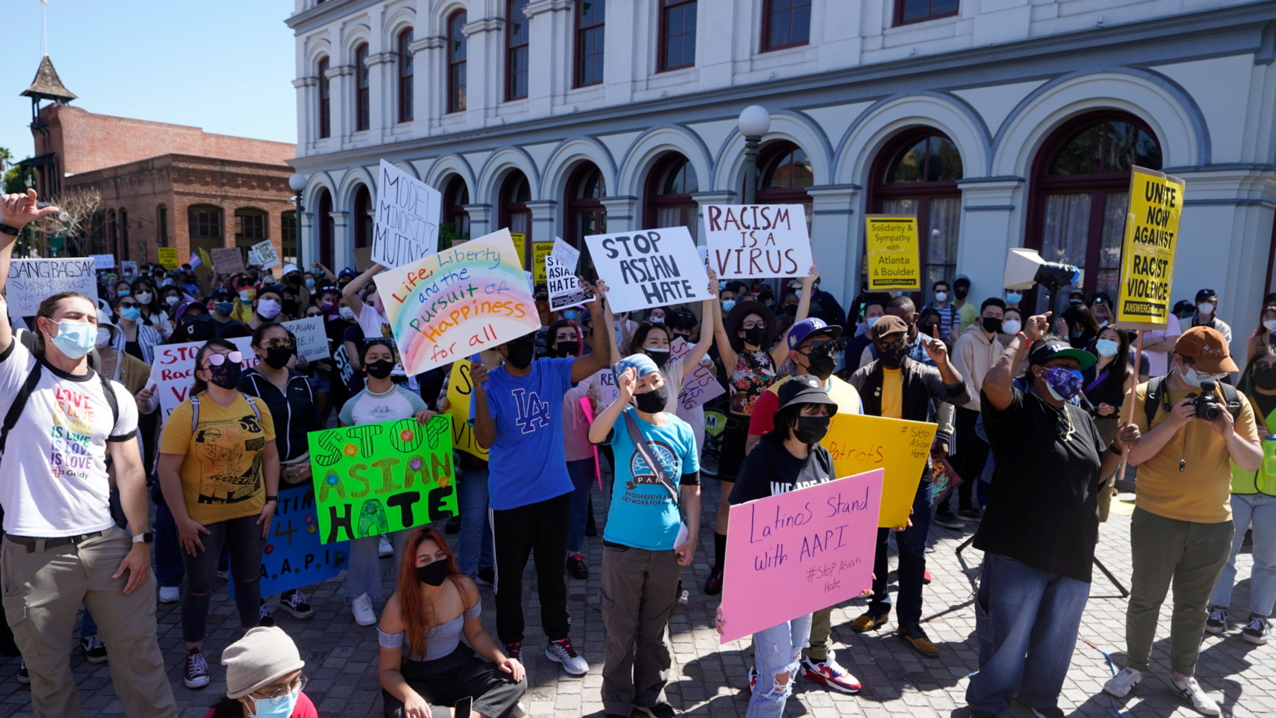 In this March 27, 2021, file photo, demonstrators rally against Asian hate crimes in El Pueblo de Los Angeles, Los Angeles Plaza Park. (AP Photo/Damian Dovarganes, File)