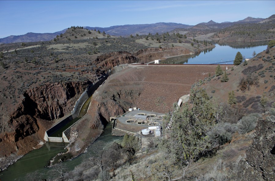 In this March 3, 2020, file photo, is the Iron Gate Dam, powerhouse and spillway are on the lower Klamath River near Hornbrook, Calif. (AP Photo/Gillian Flaccus, File)