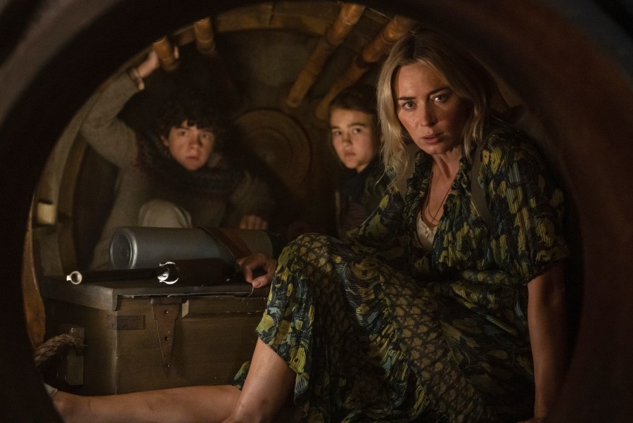 This image released by Paramount Pictures shows, from left, Noah Jupe, Millicent Simmonds and Emily Blunt in a scene from "A Quiet Place Part II." (Jonny Cournoyer/Paramount Pictures via AP)