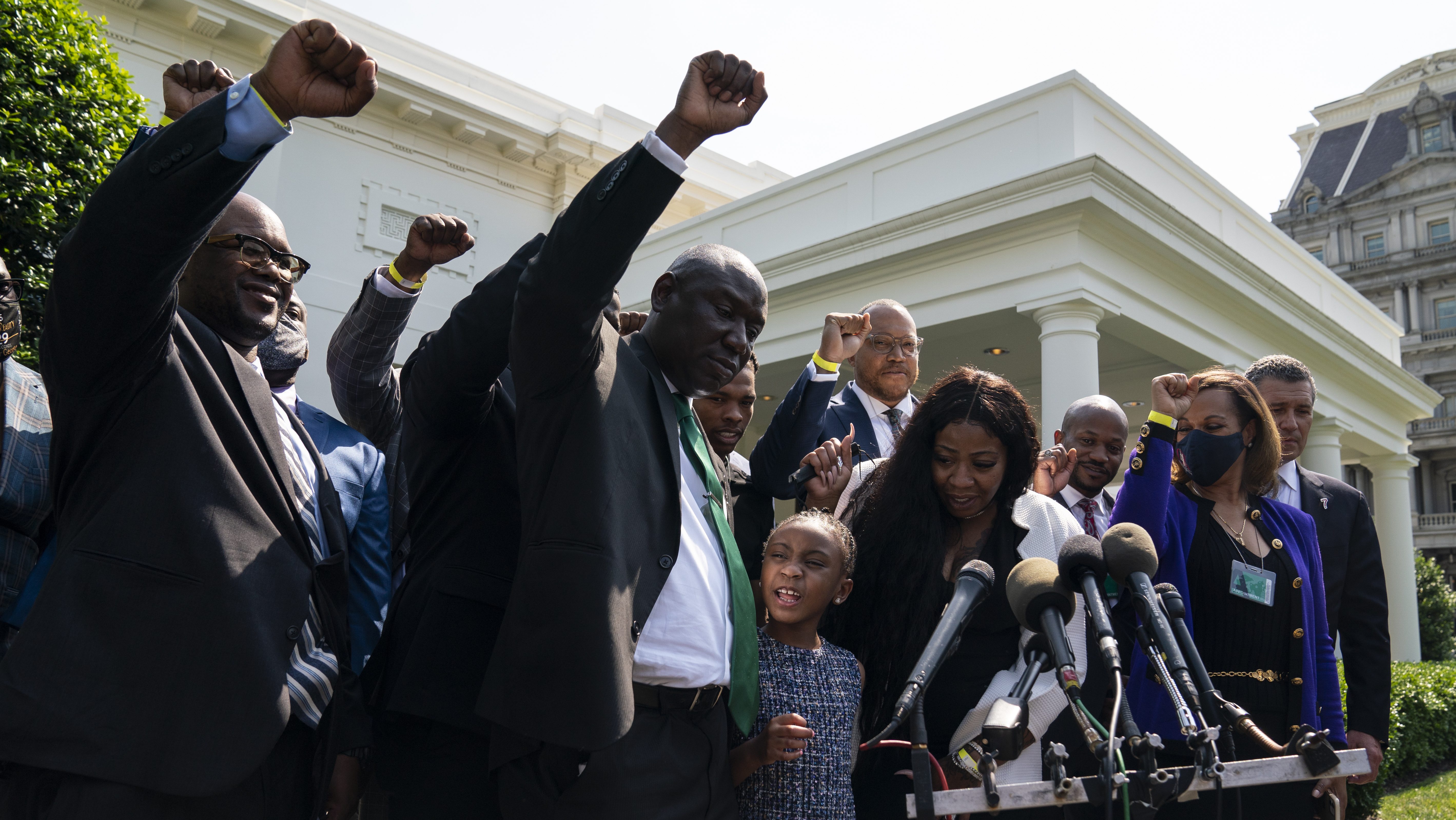 Gianna Floyd, the daughter of George Floyd, leads the chant "say his name" as members of the Floyd family talk with reporters after meeting with President Joe Biden at the White House on May 25, 2021. (Evan Vucci / Associated Press)