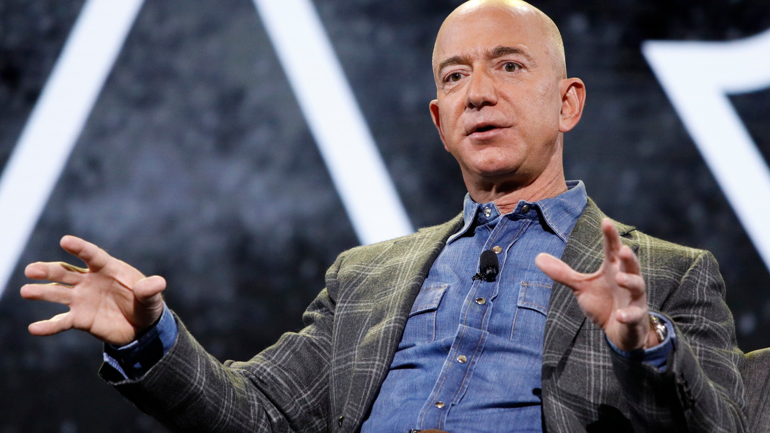 Amazon CEO Jeff Bezos speaks at the the Amazon re:MARS convention in Las Vegas on June 6, 2019. (John Locher / Associated Press)