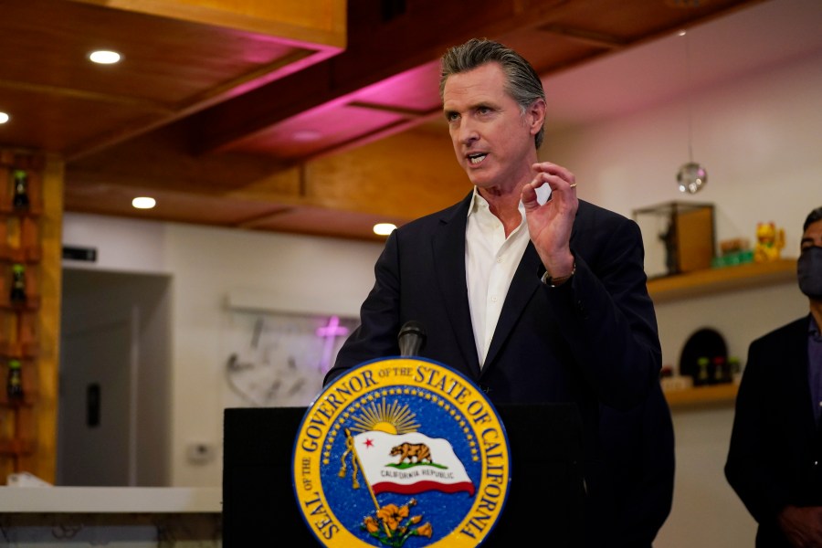 California Gov. Gavin Newsom speaks at Hanzo Sushi Thursday, April 29, 2021, in San Fernando, Calif. Businesses could be spared billions of dollars of higher taxes in coming years as a result of federal coronavirus relief funds flowing to the states. Newsom announced a budget plan this spring that would use $1.1 billion from the latest federal COVID-19 relief law to bolster a depleted unemployment compensation accounts. (AP Photo/Marcio Jose Sanchez, file)